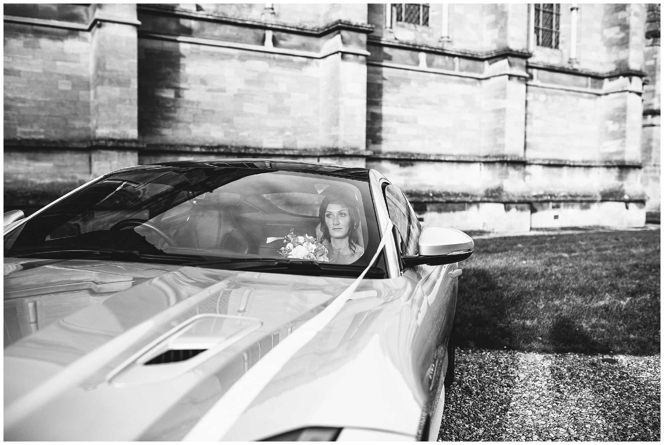 bride sat in wedding sports car