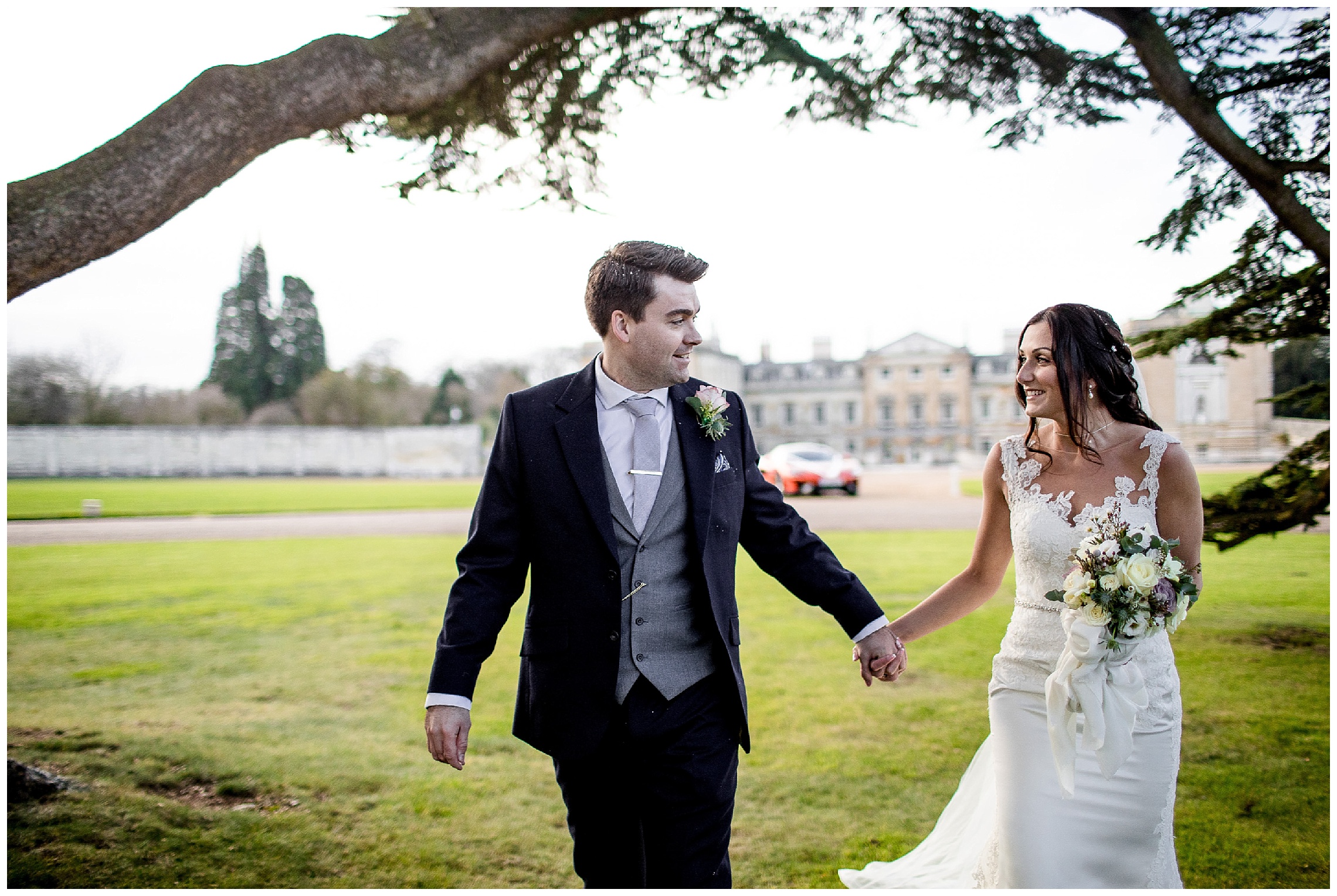 bride and groom in front of the cedar tree at a woburn sculpture gallery wedding