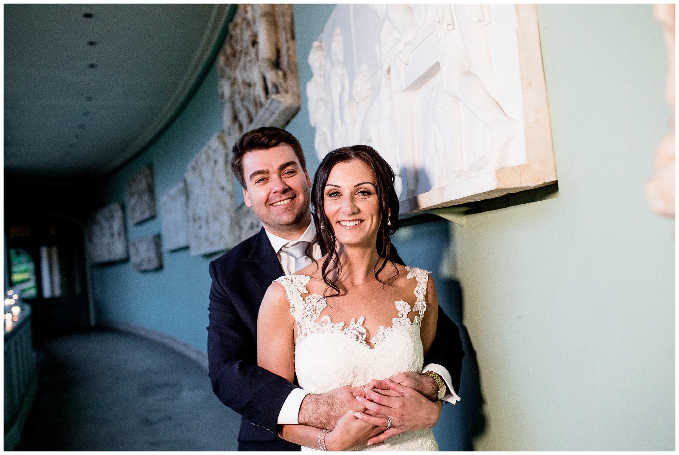 bride and groom in henry holland corridor at a woburn sculpture gallery wedding