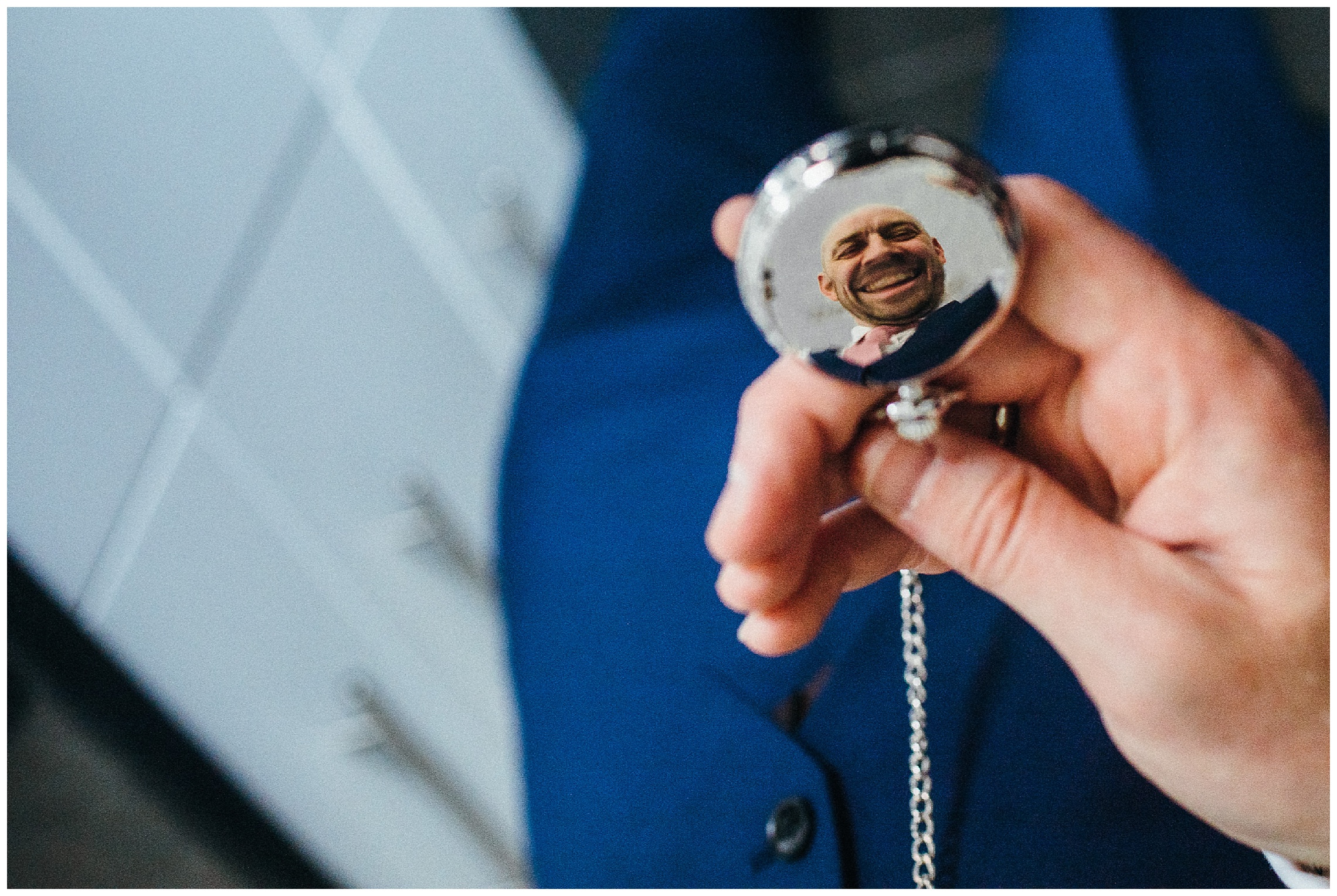 reflection in pocket watch at cock hotel wedding