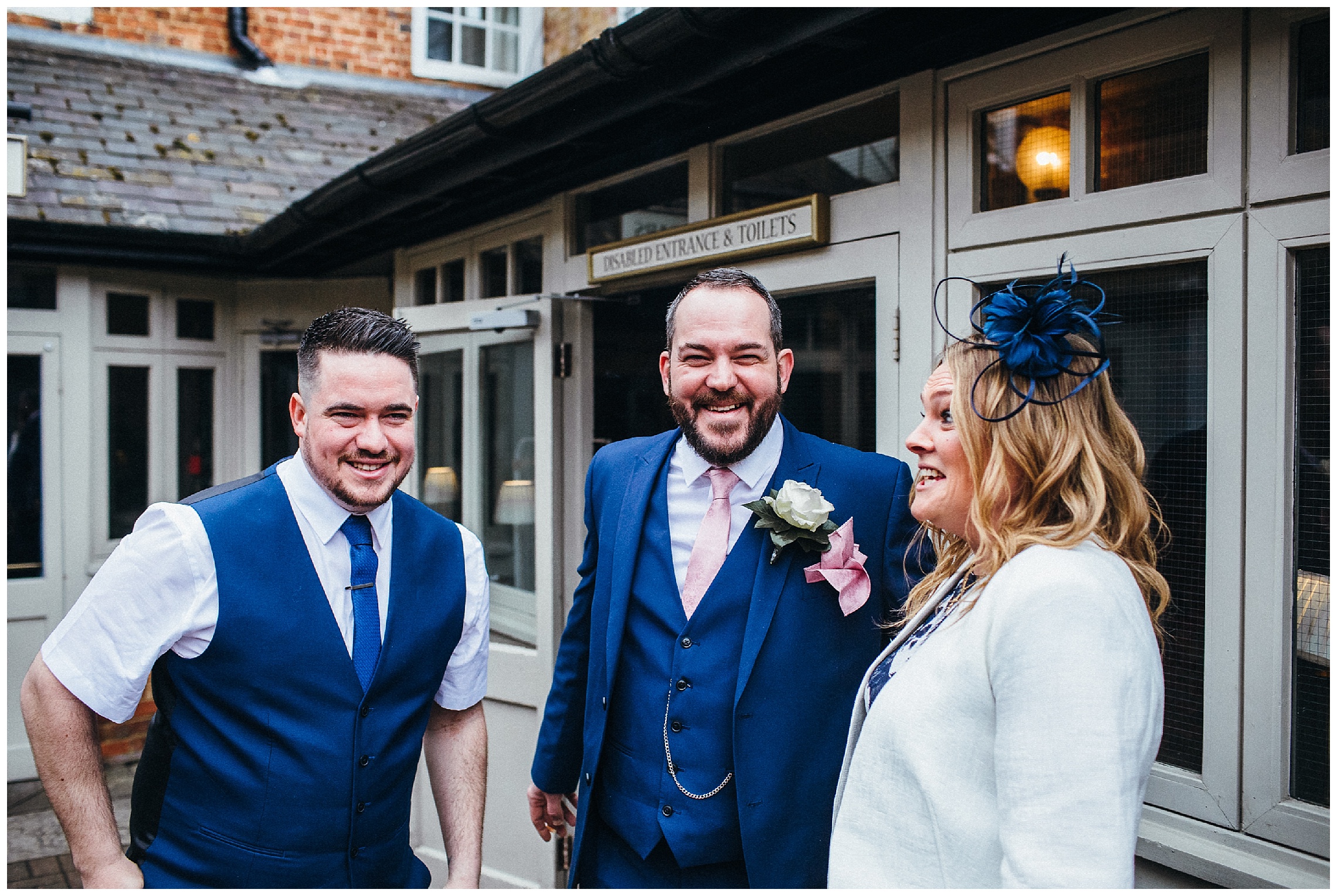 groom and guests at cock hotel