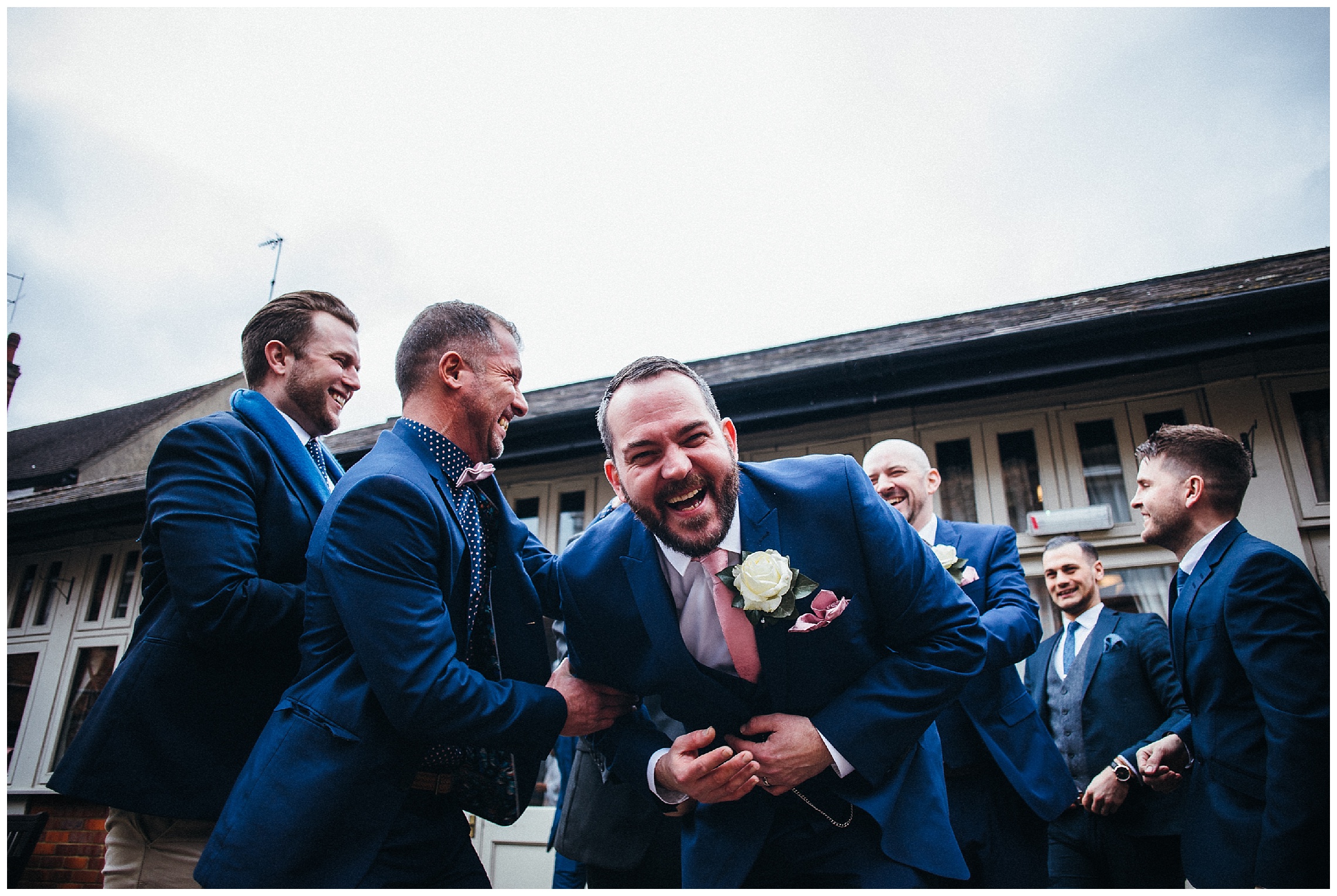 groomsmen at the cock hotel wedding