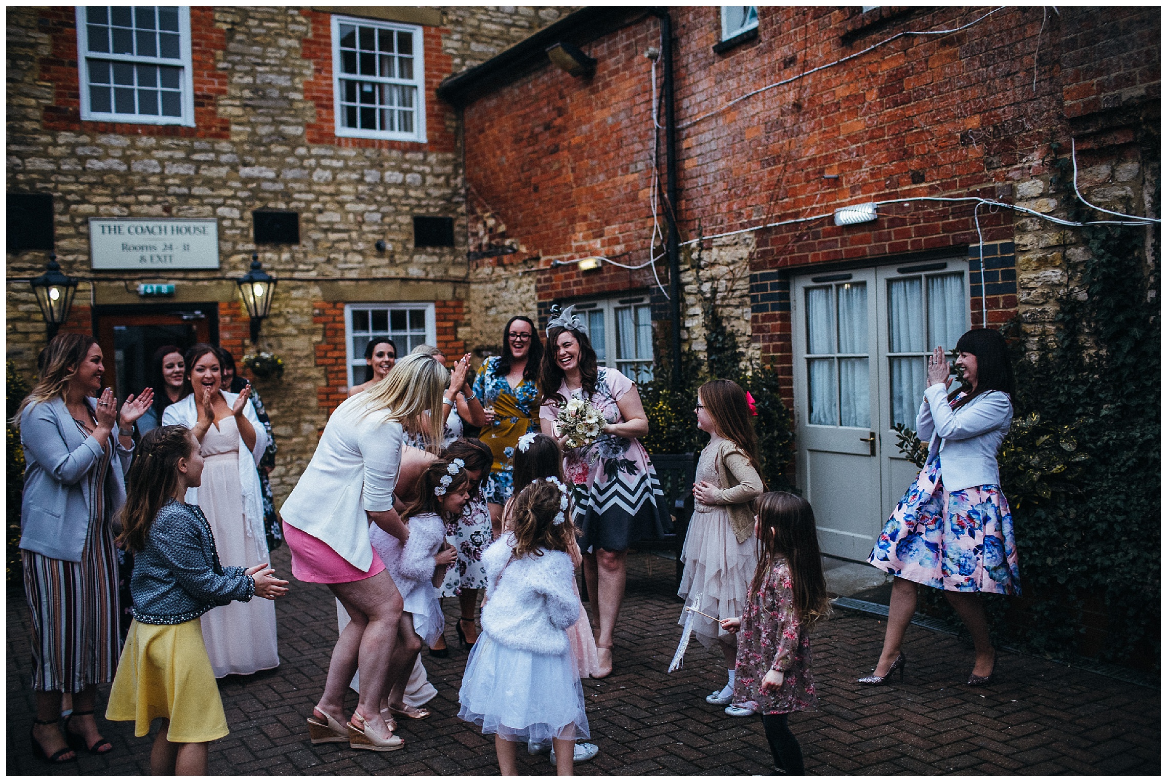 guests caught the bouquet at cock hotel wedding