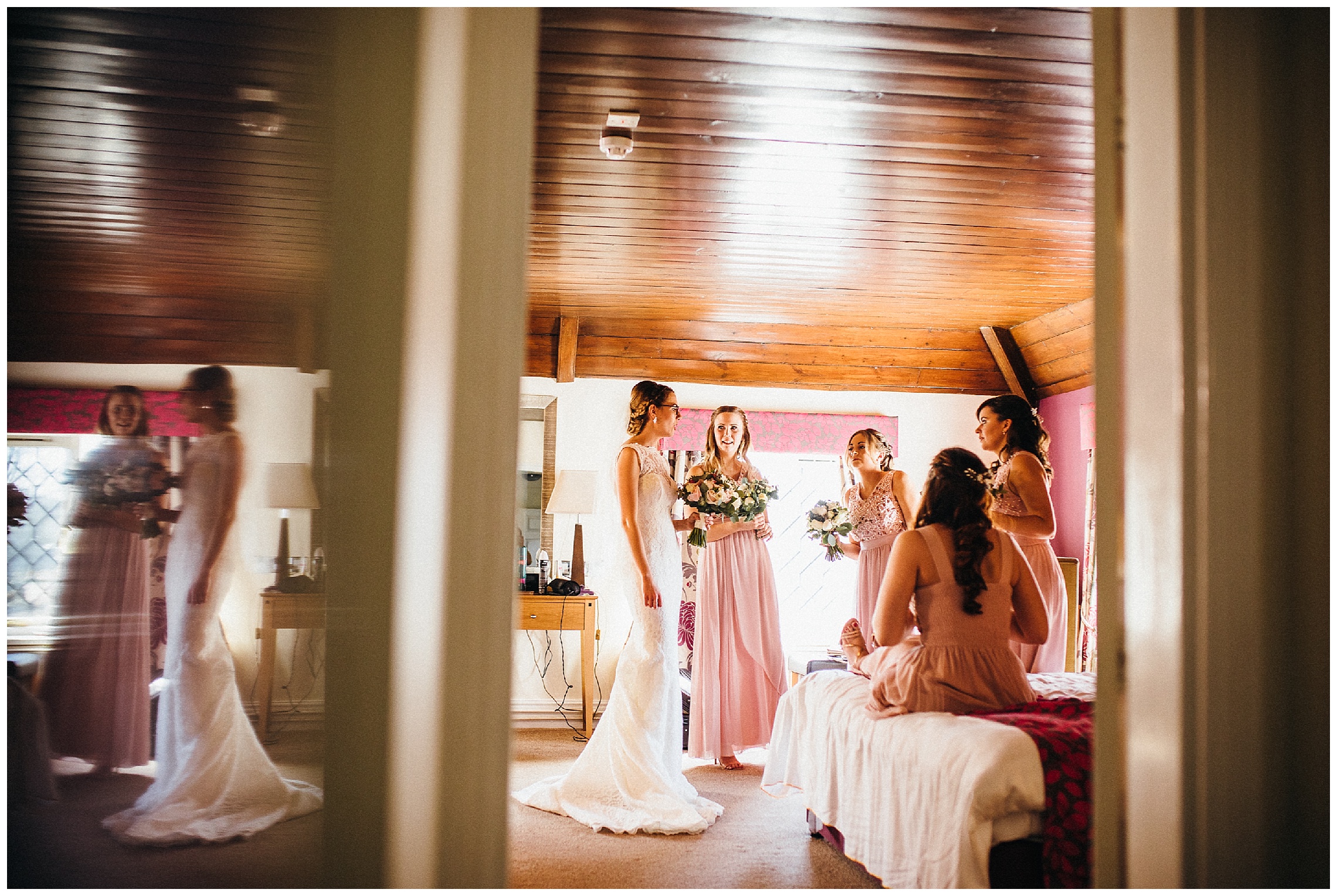 bride and bridesmaids getting ready in the bridal suite at the barns hotel