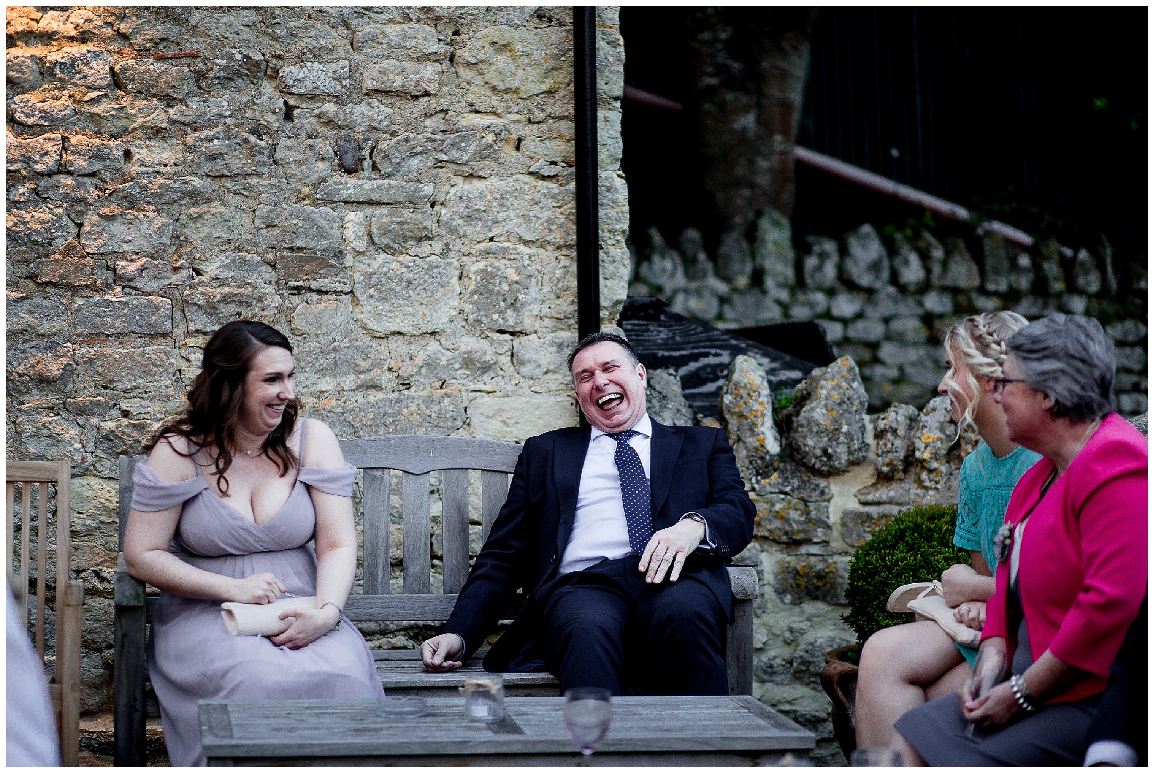 guests laughing at notley tythe barn