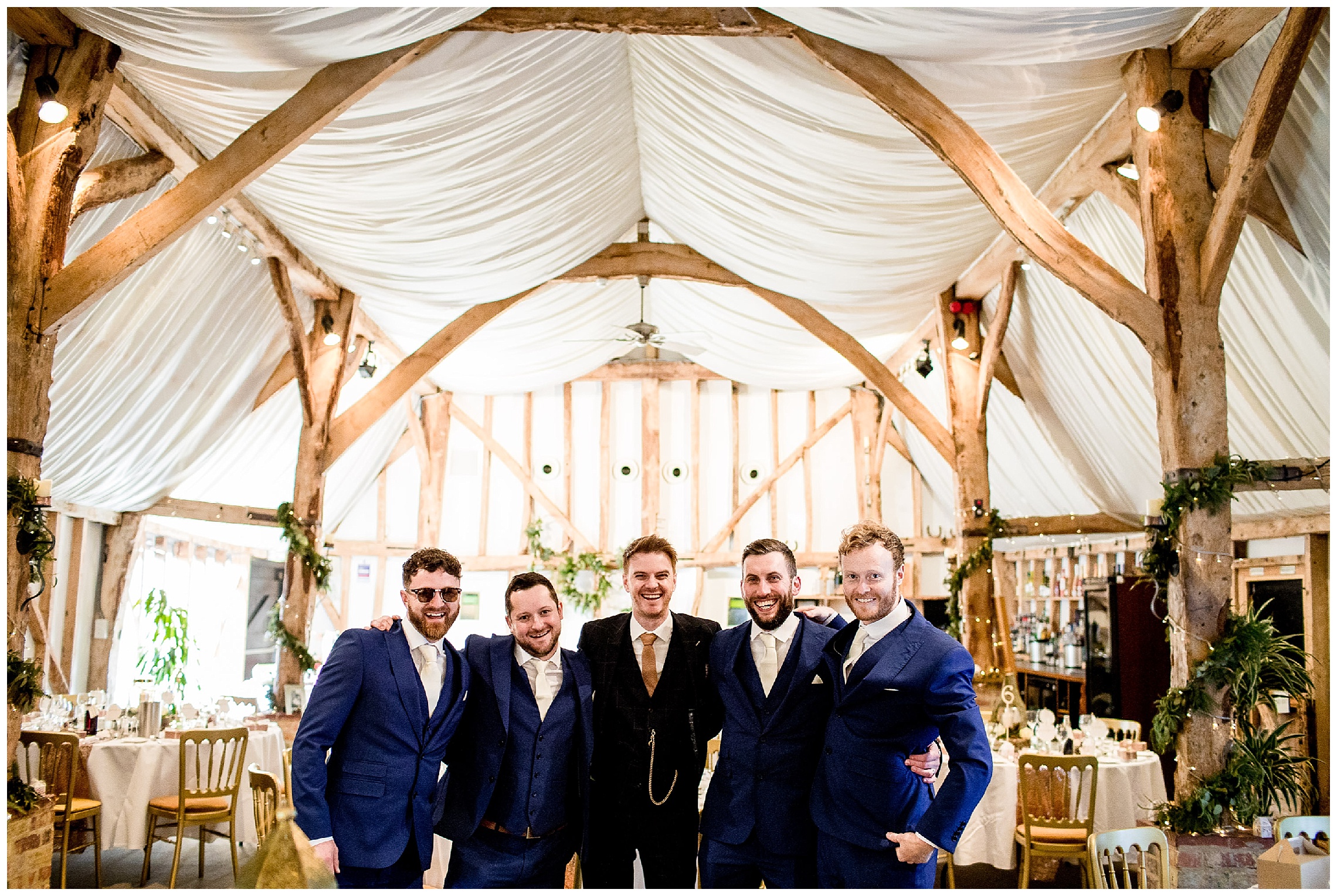 groomsmen in the great barn at south farm
