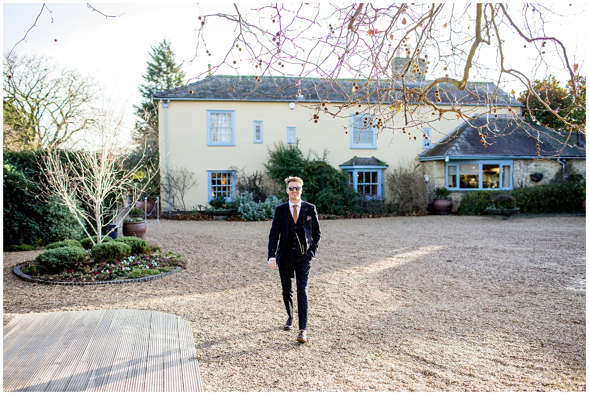 groom crosses the courtyard on his own at south farm