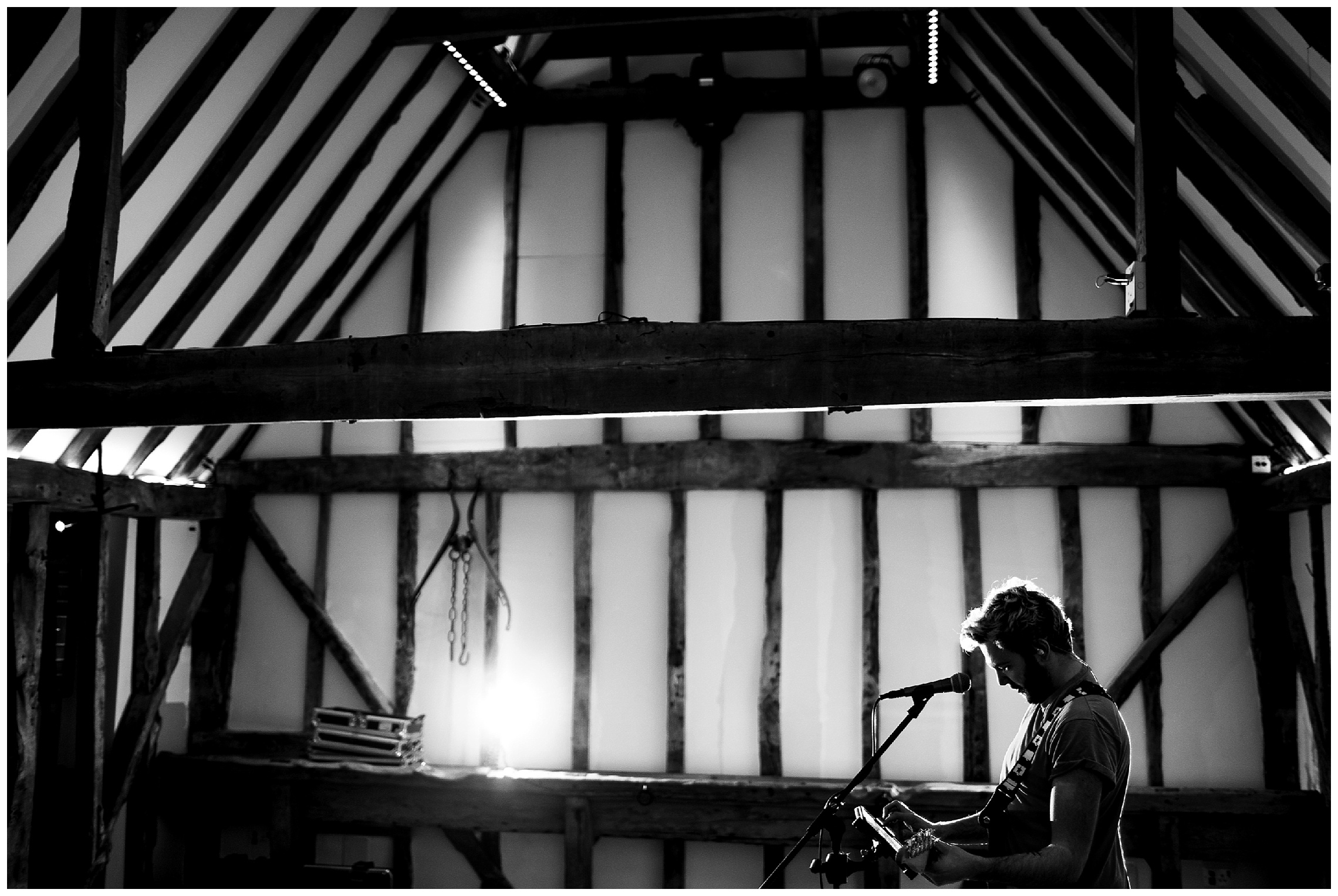 happy hour band member on the dance floor performing sound check at south farm