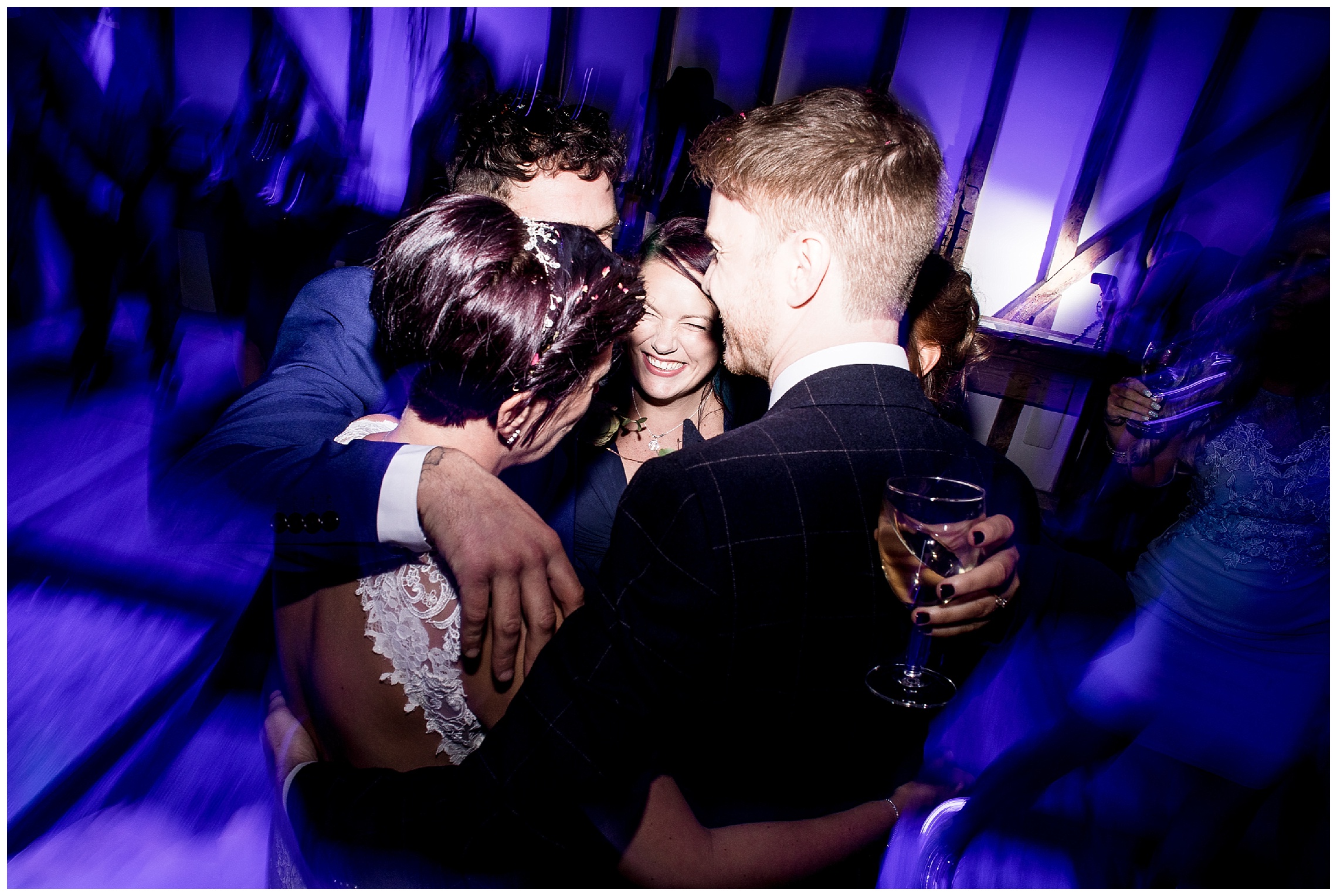 group hug with bride groom and their friends at south farm