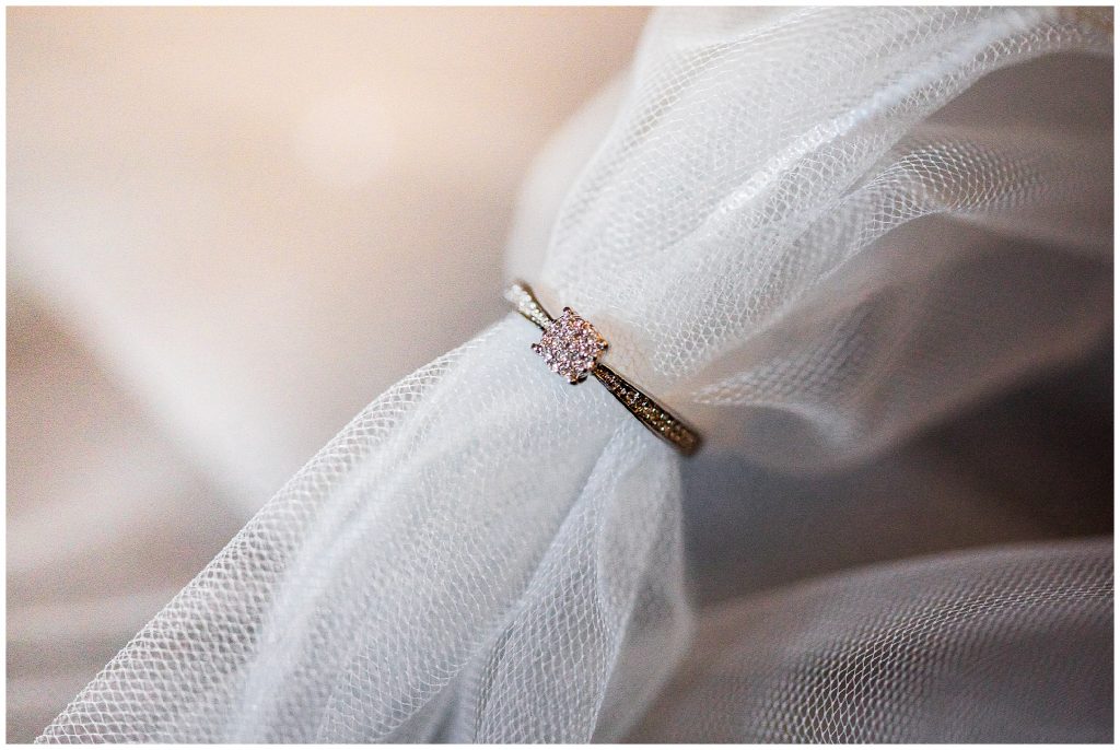 Engagement ring and veil close up 