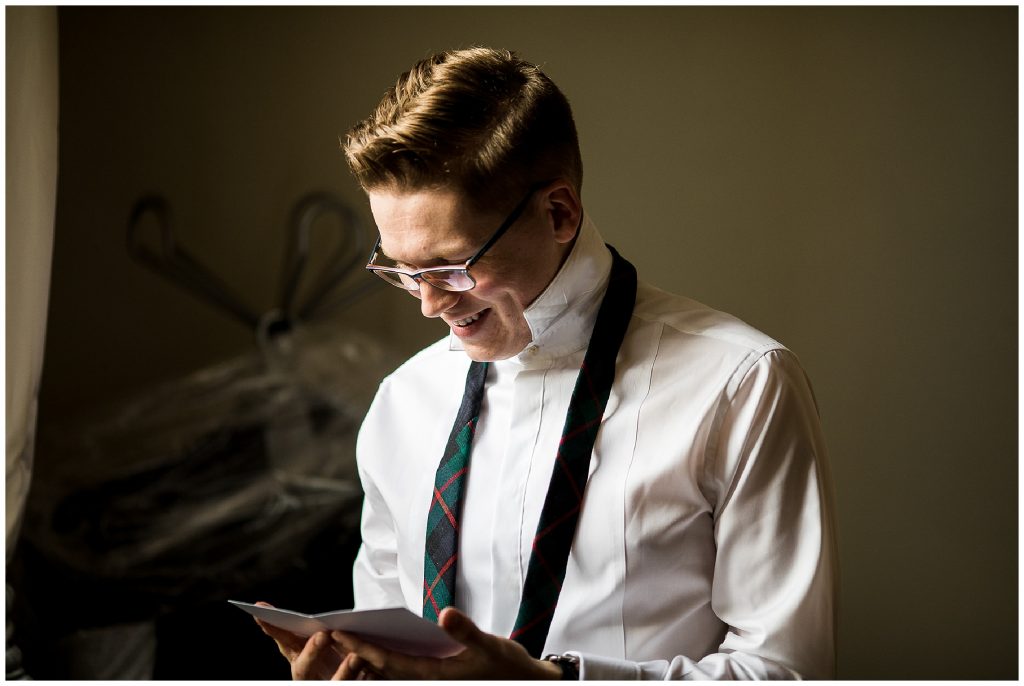 bridegroom reading letter from bride 