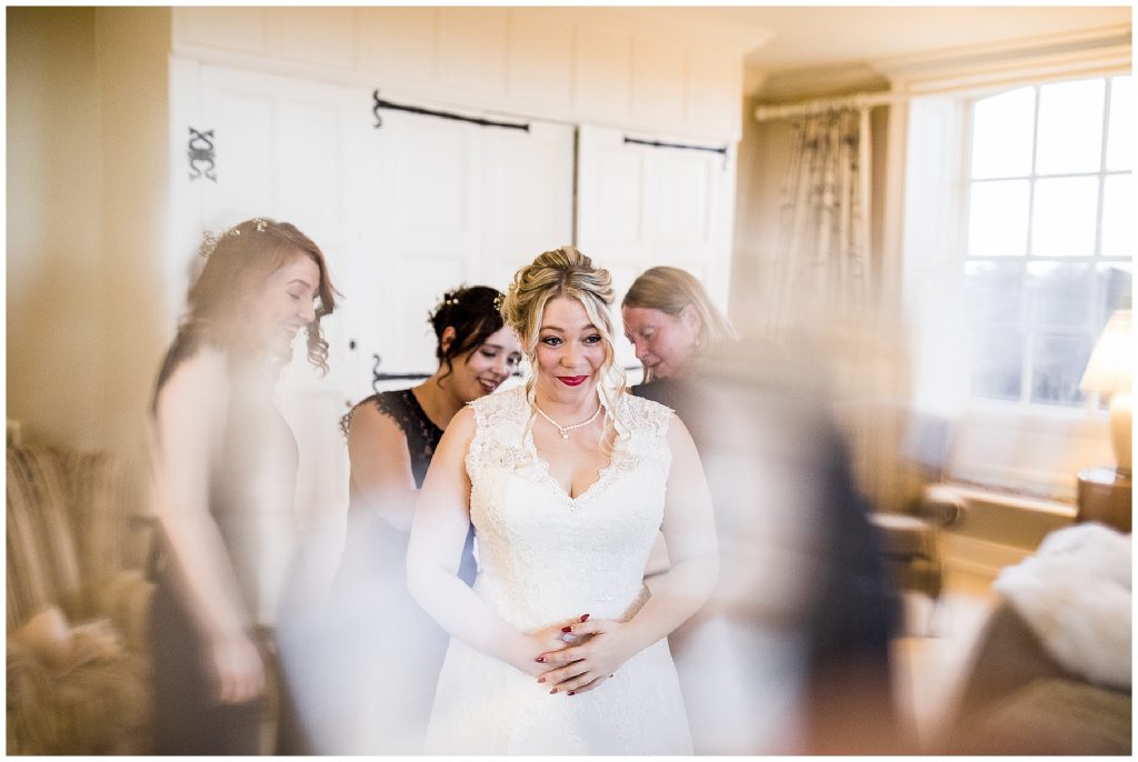 bride see's herself in the mirror 