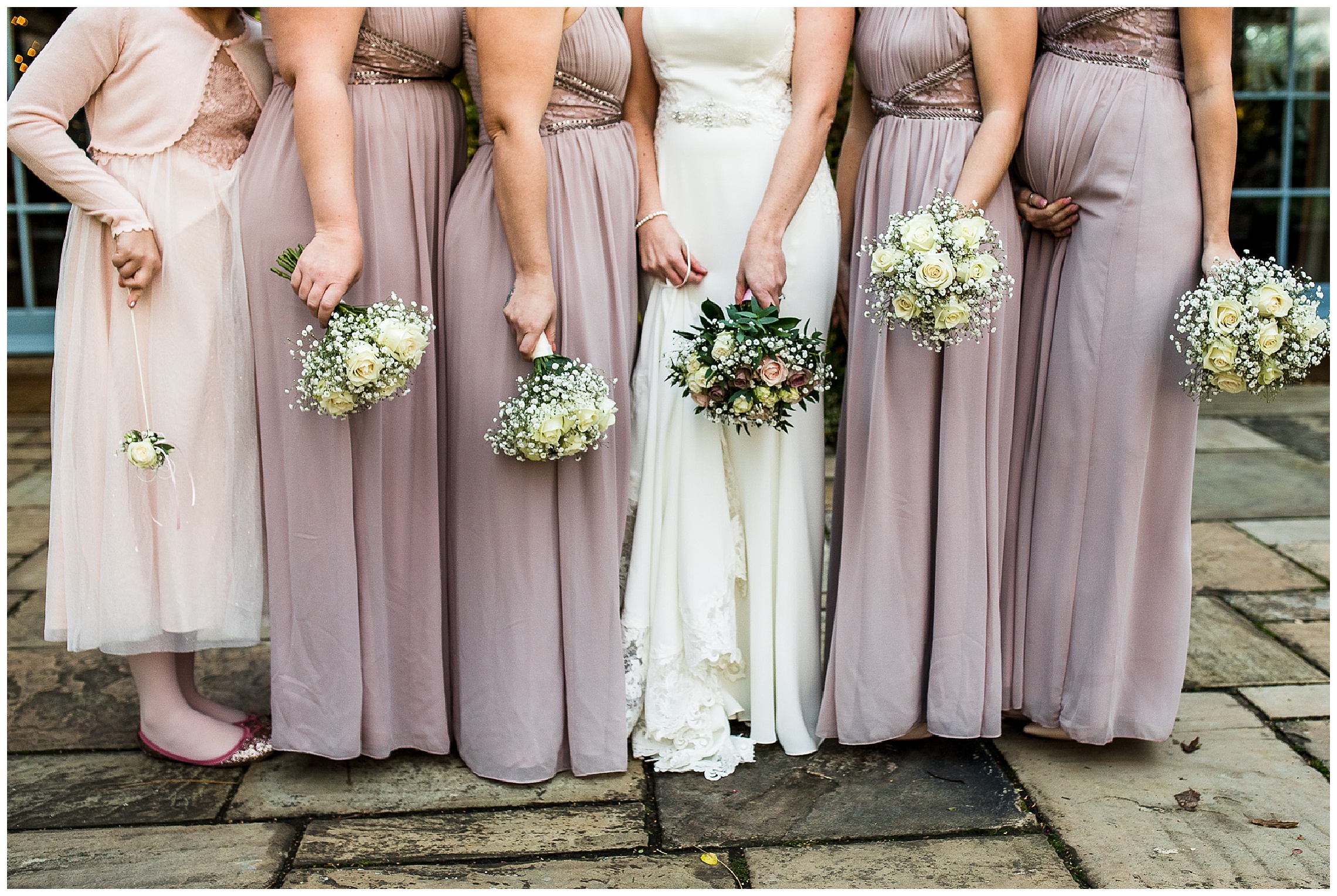 lilac bridesmaids dresses and light wedding bouquets.