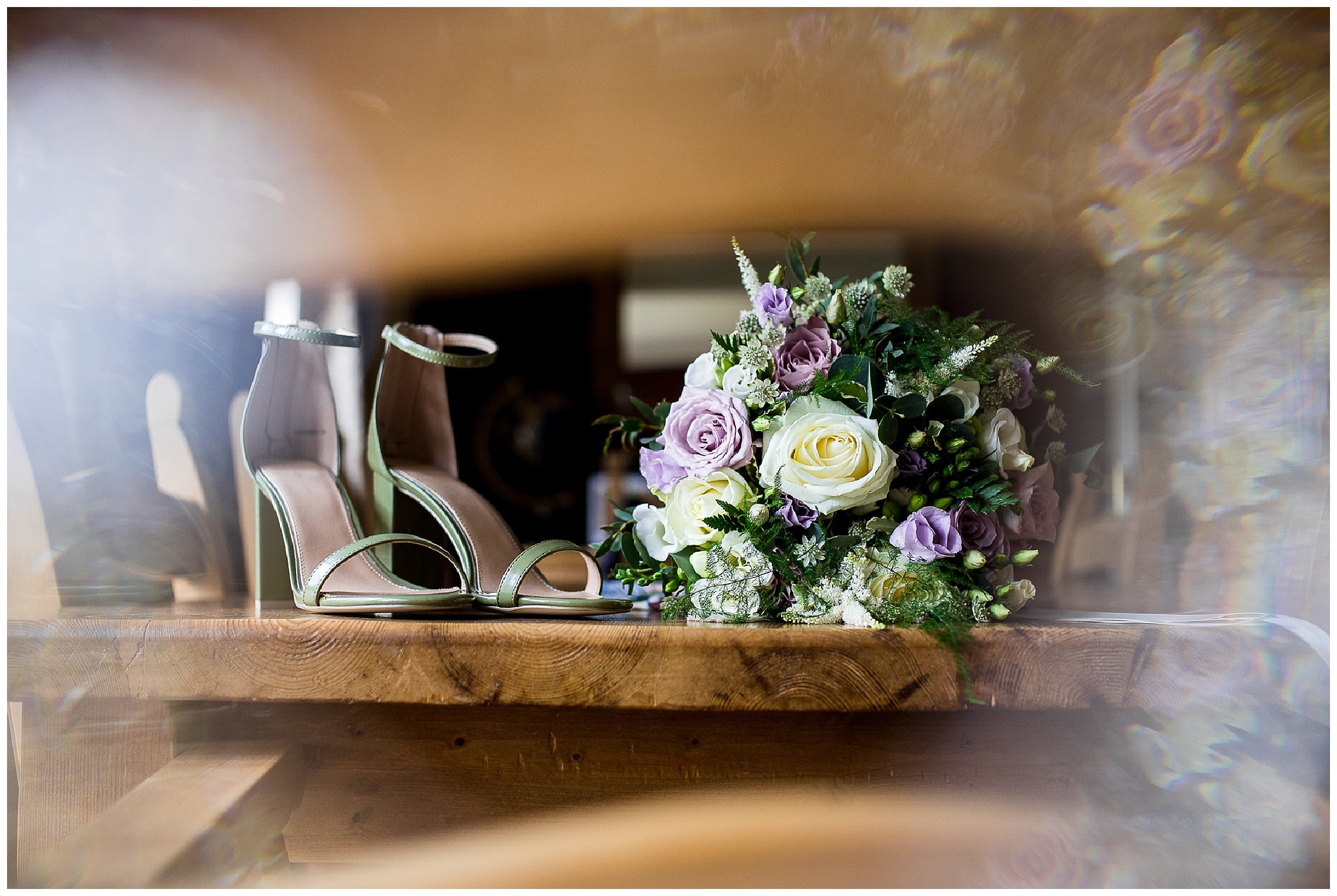 purple and white wedding bouquet with green scrappy wedding shoes