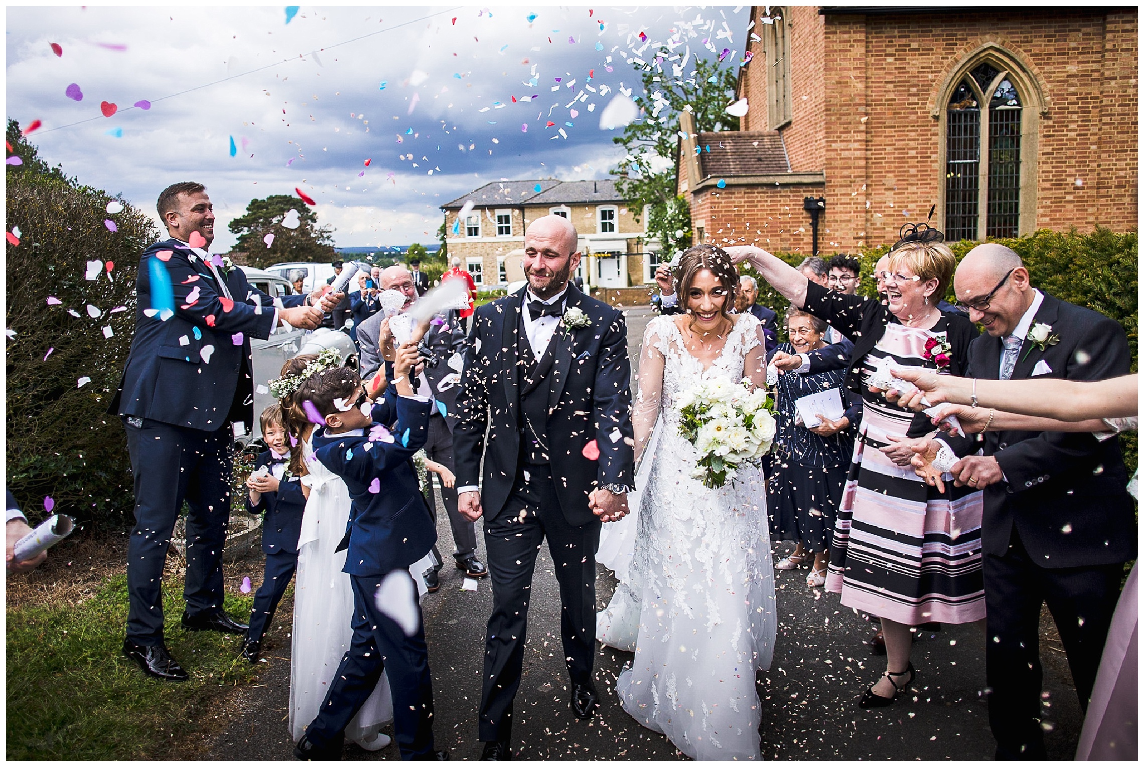 confetti shot with bride and groom