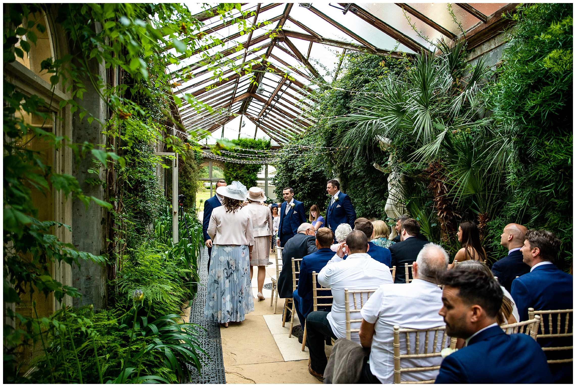 somerleyton hall ceremony with greenery and fairy lights