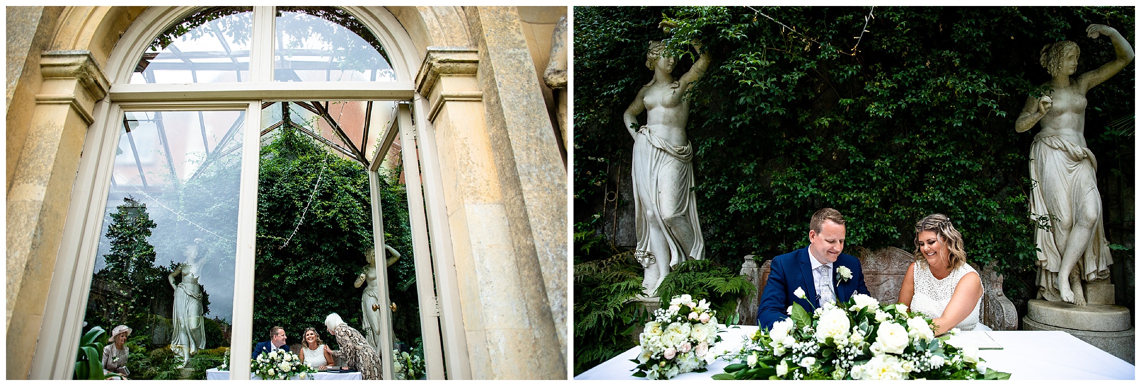 bride and groom sign register with statues either side of them