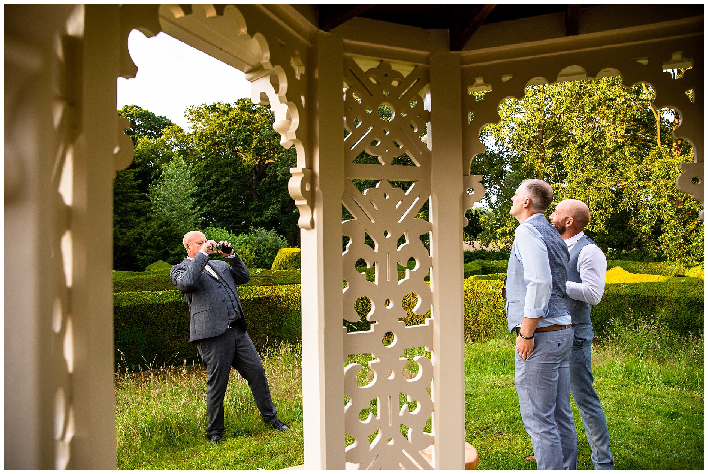 wedding guests taking photos