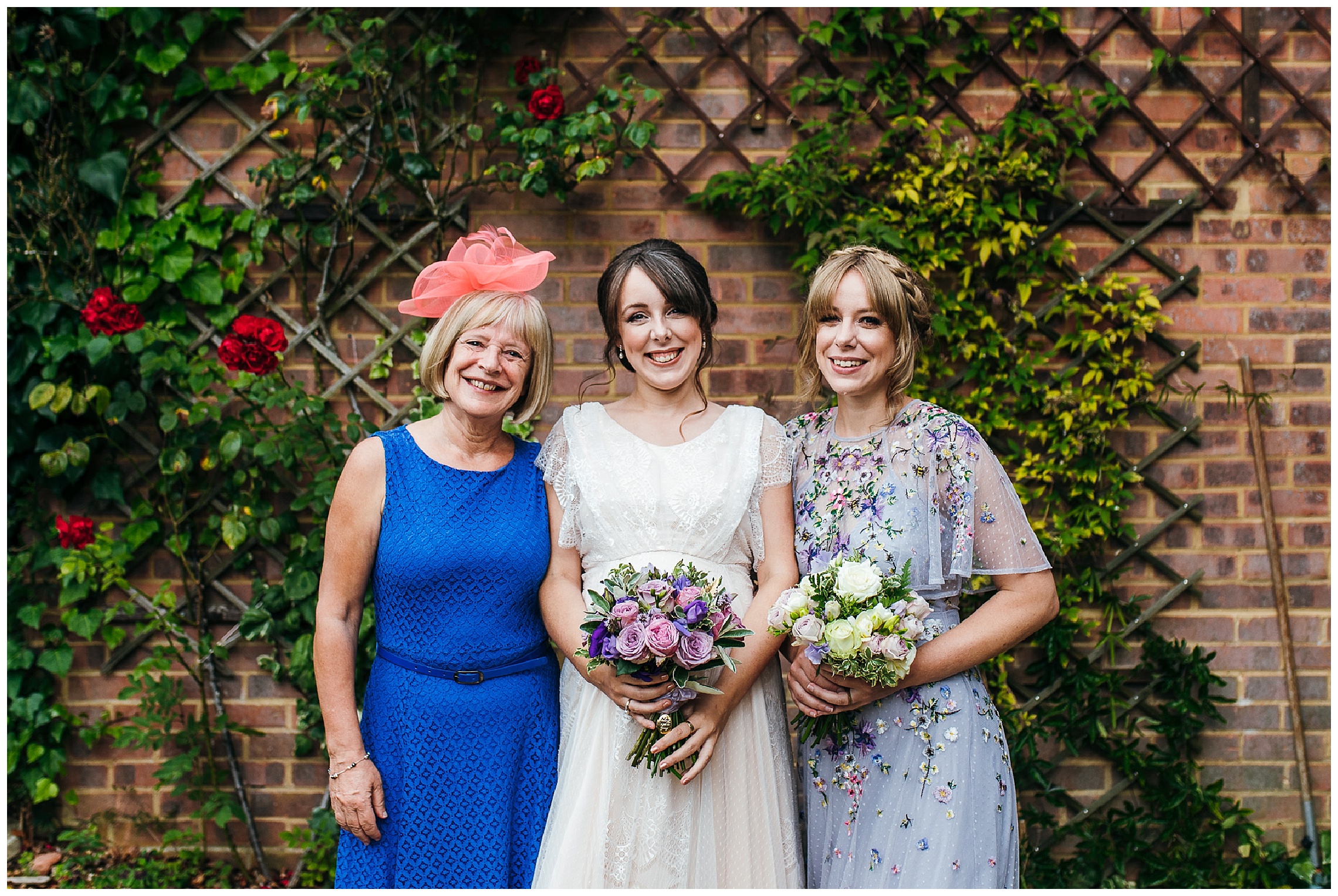 bride in garden with sister and mother of bride