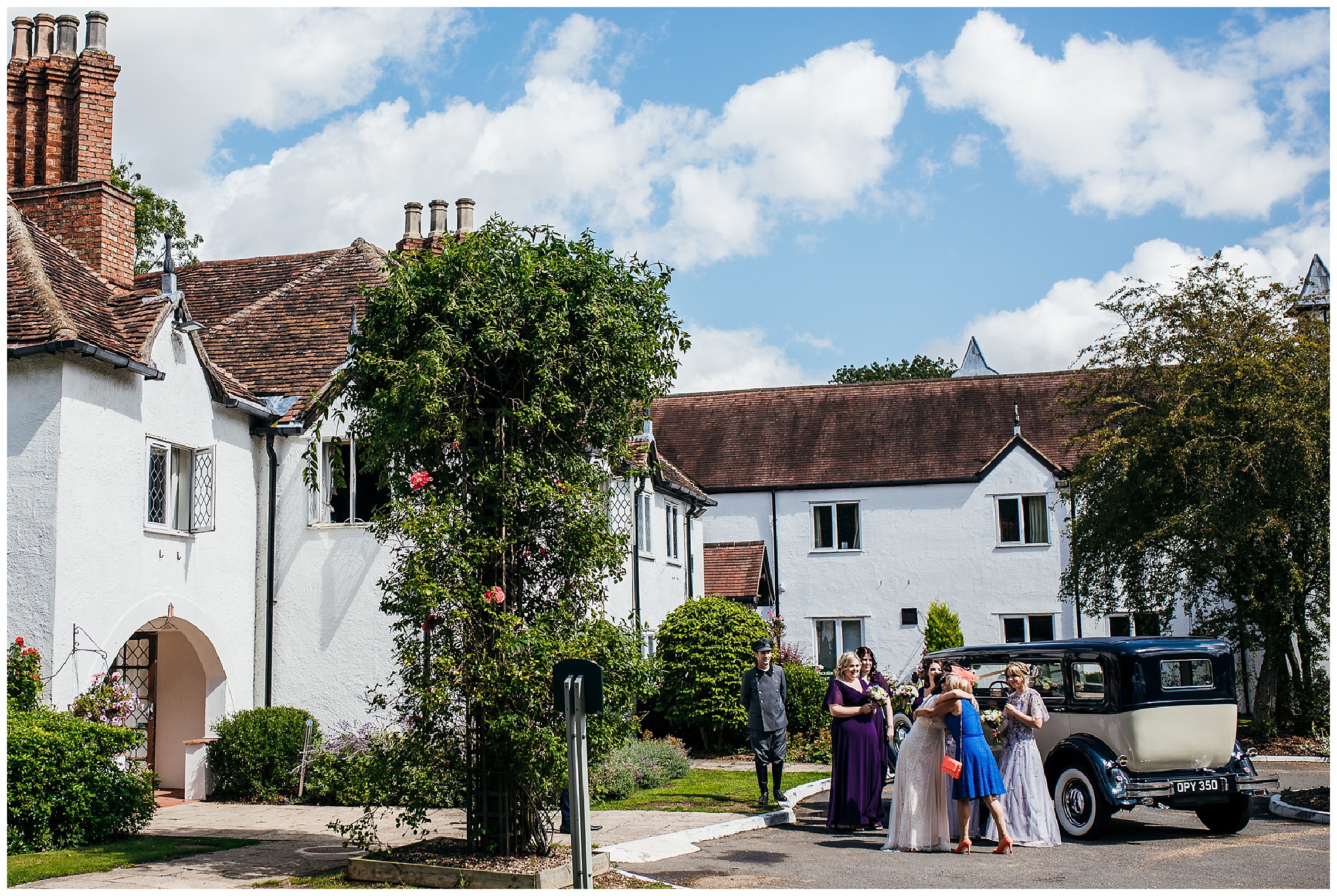 white barns hotel on bright sunny day with blue skies