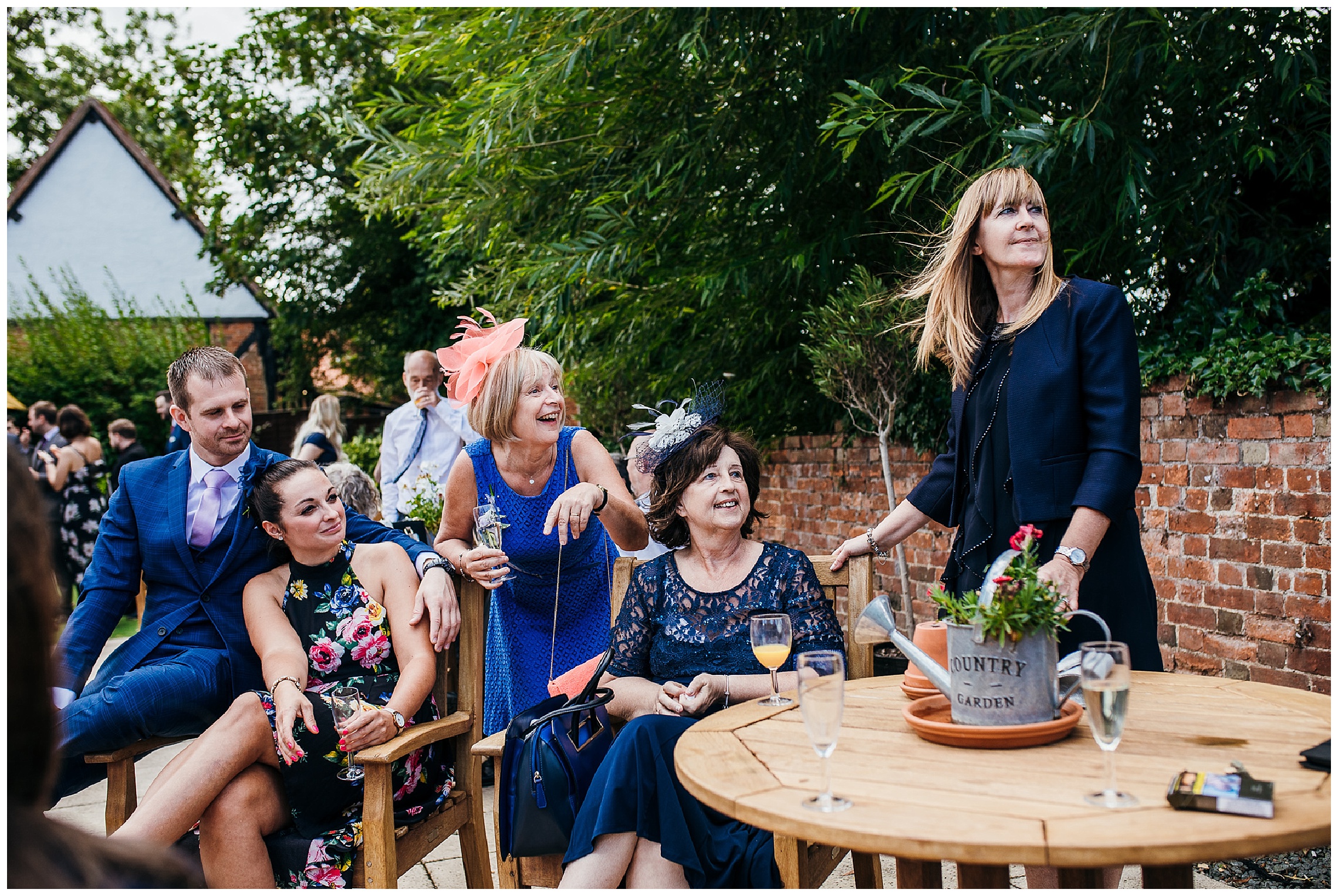 wedding guests sitting and talking