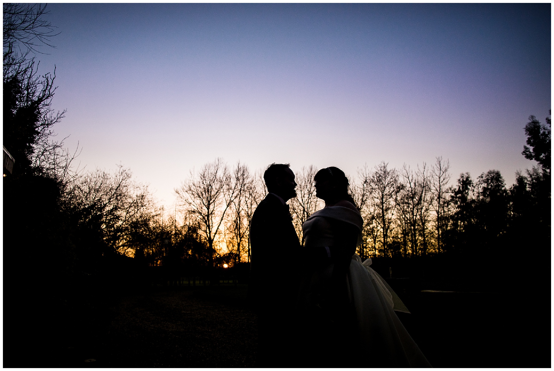 silhouette of bride and groom