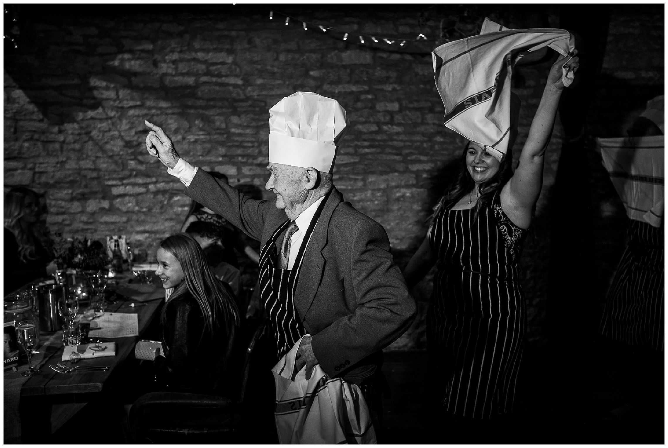 chef hats on wedding guests