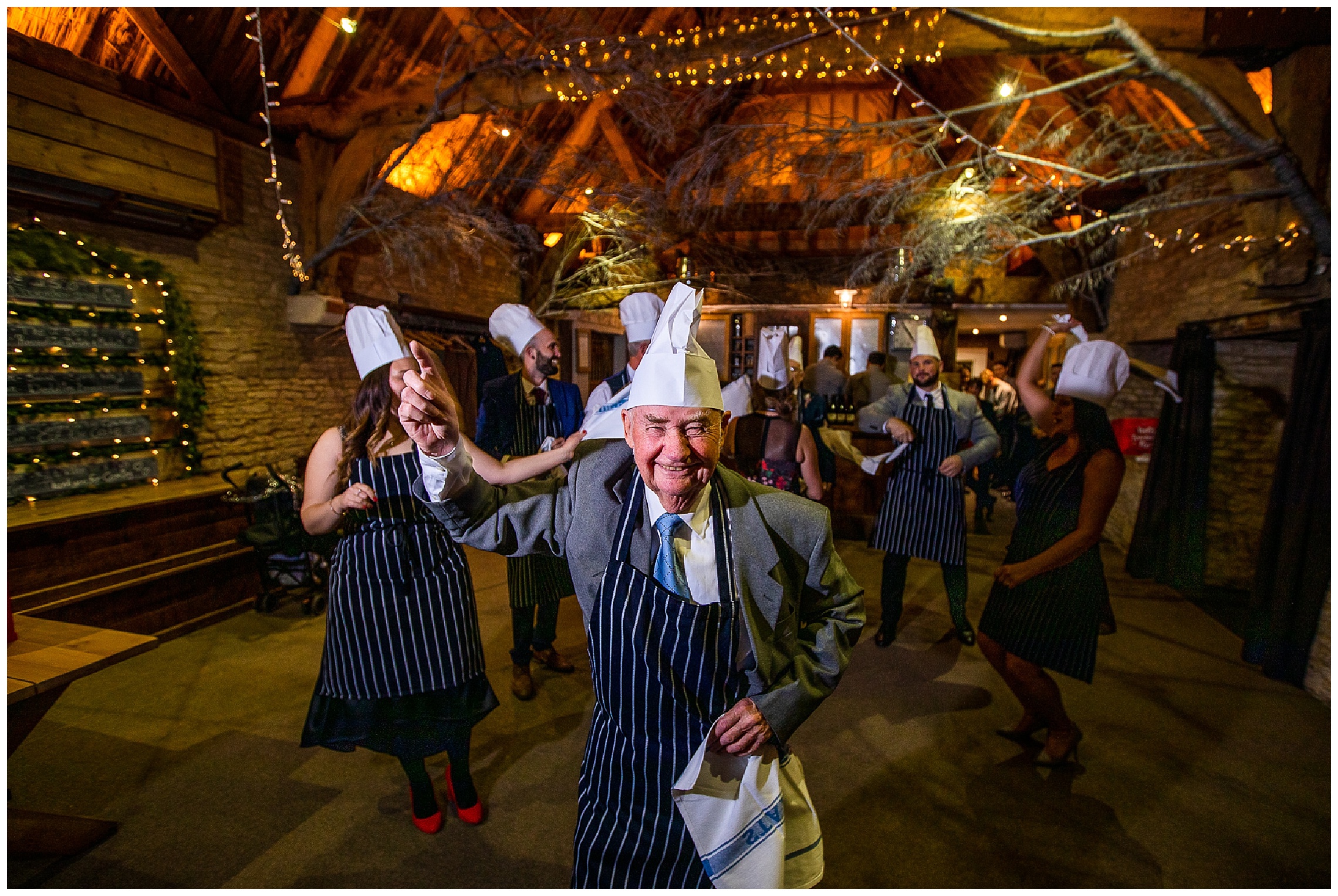 wedding guests dancing before carvery at tythe barn in launton