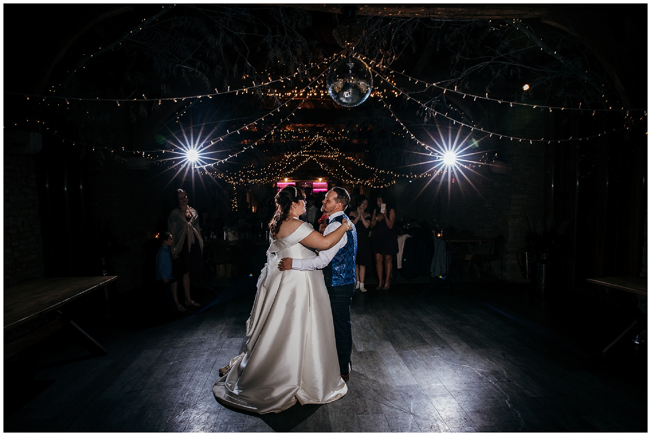 first dance in dark spotlit