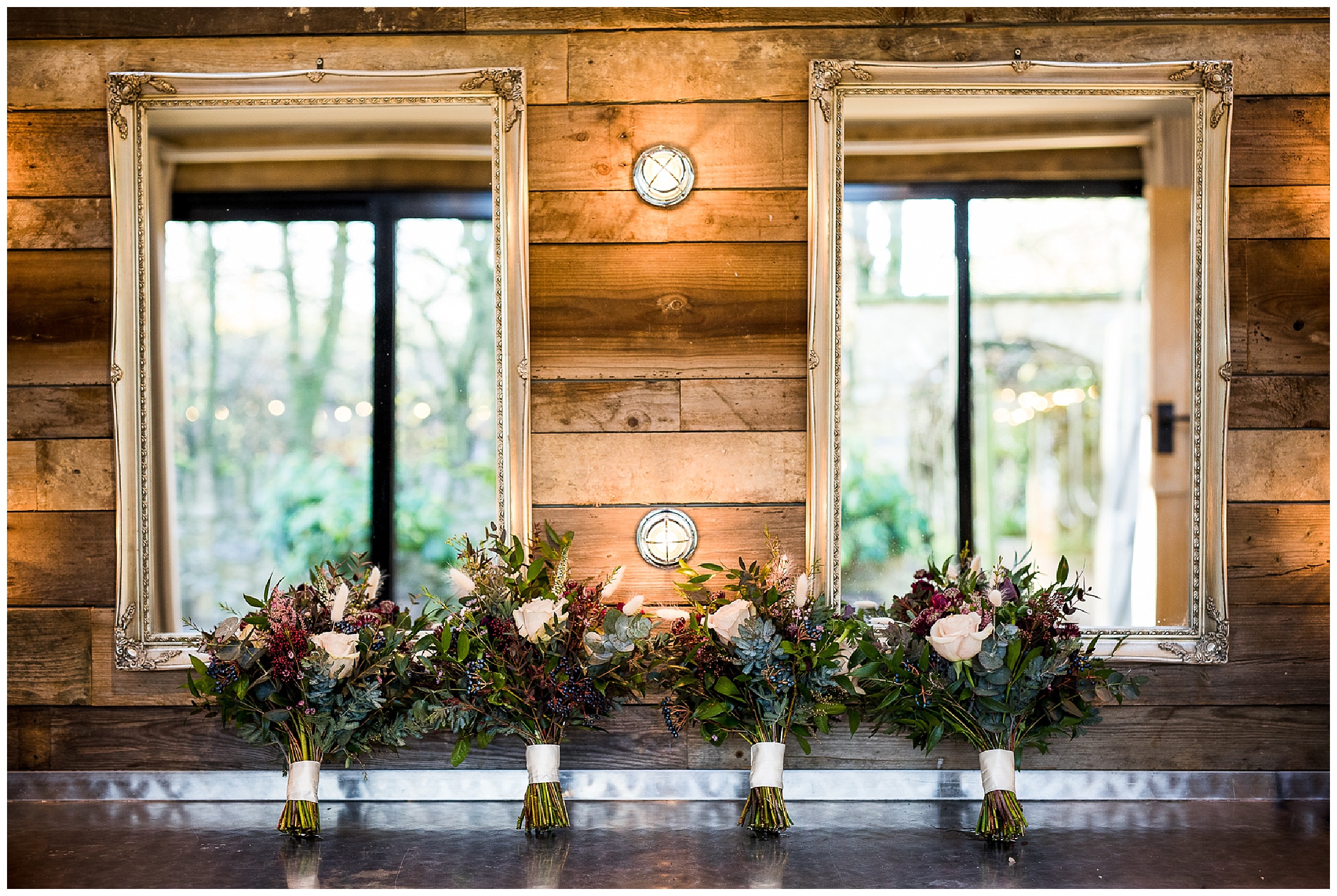 bridal nook in tythe barn in launton, bridesmaids bouquets resting against prep mirrors