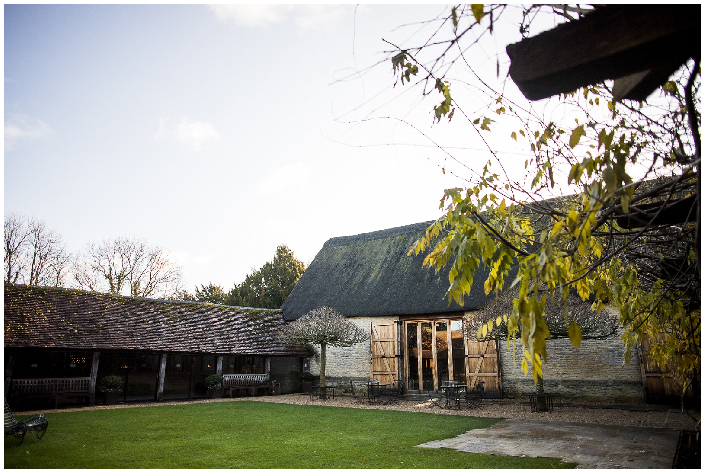 tythe barn in launton outside on wintery bright day