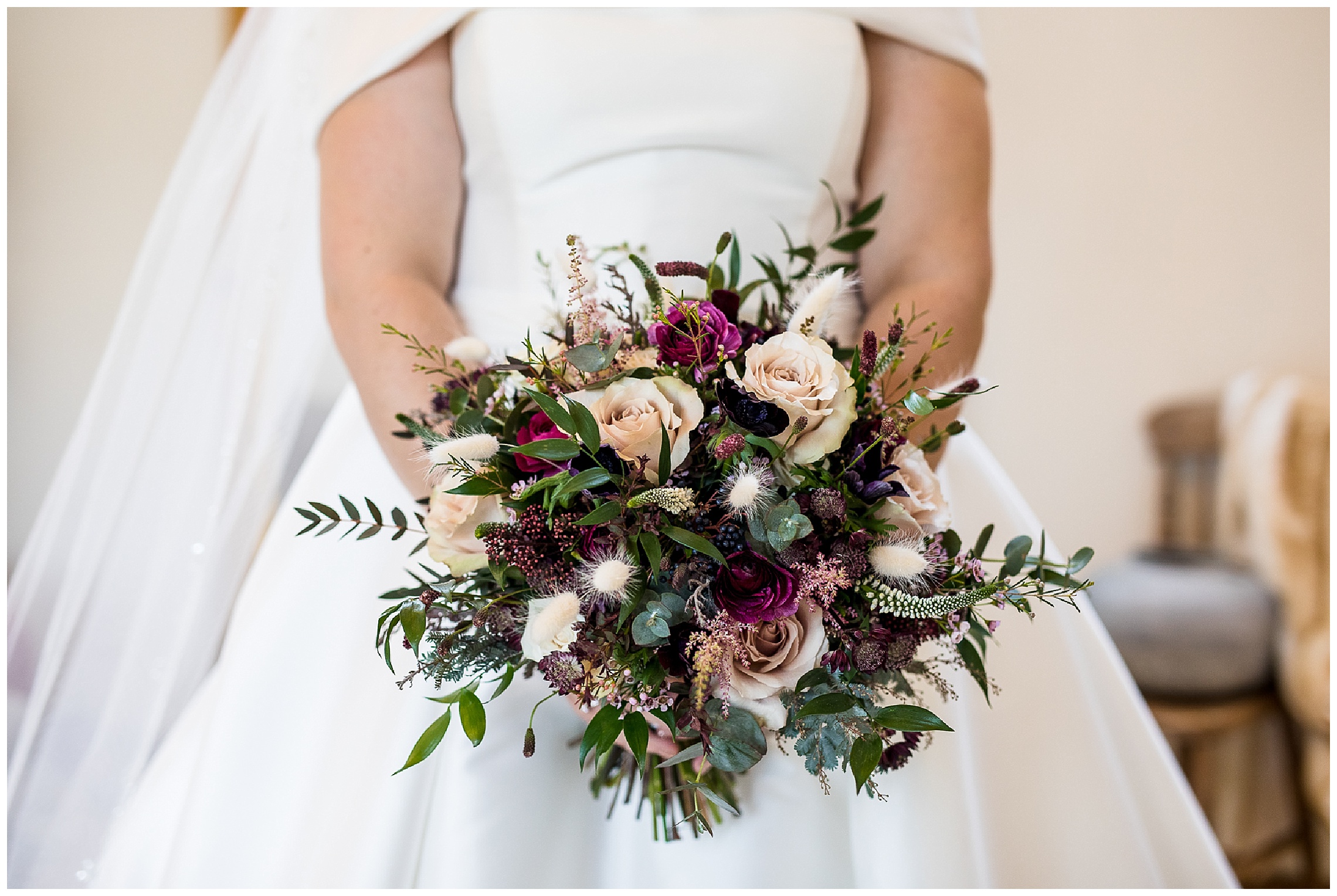 wintery bridal bouquet with deep reds and pinks