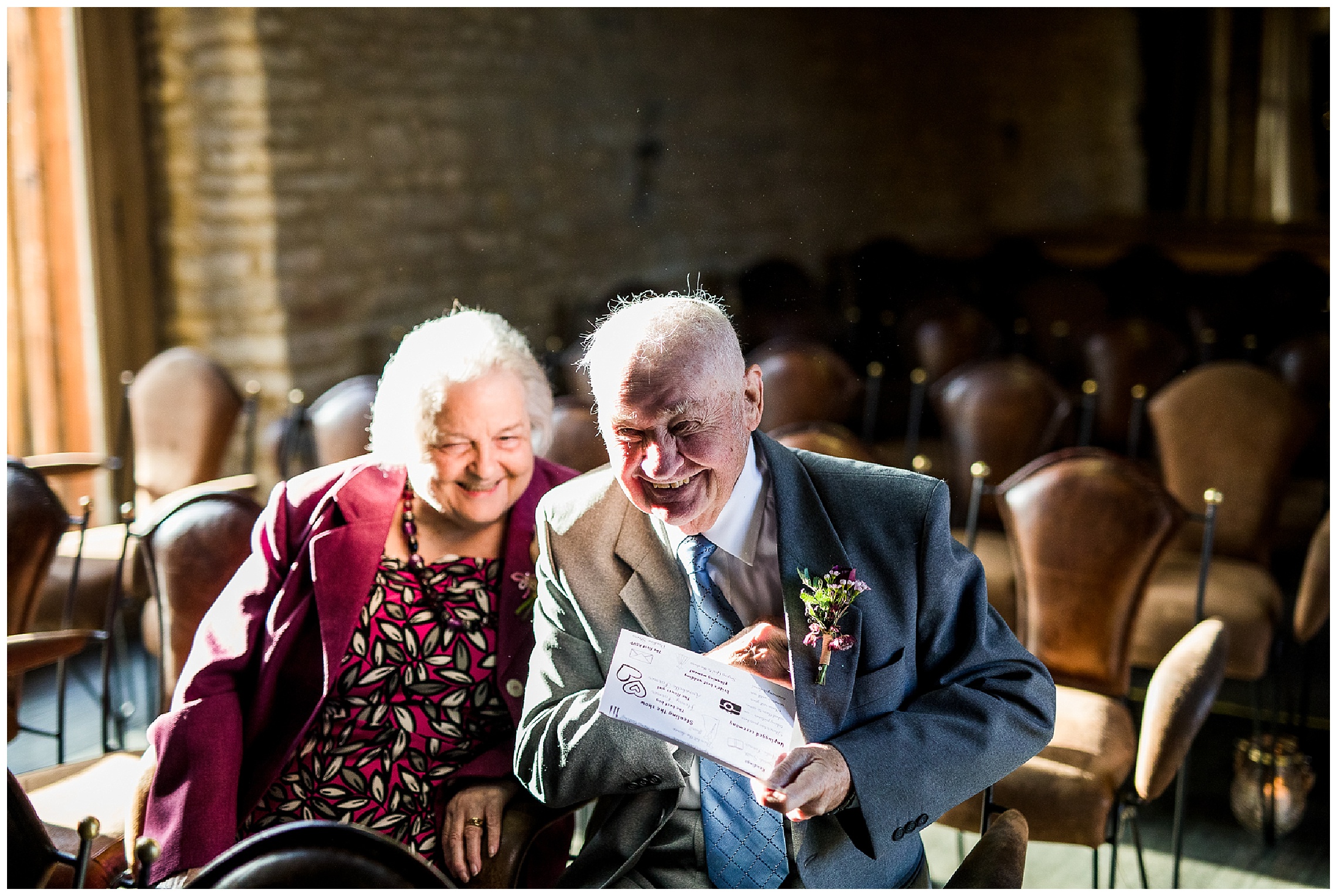 brides grandad laughing before wedding ceremony