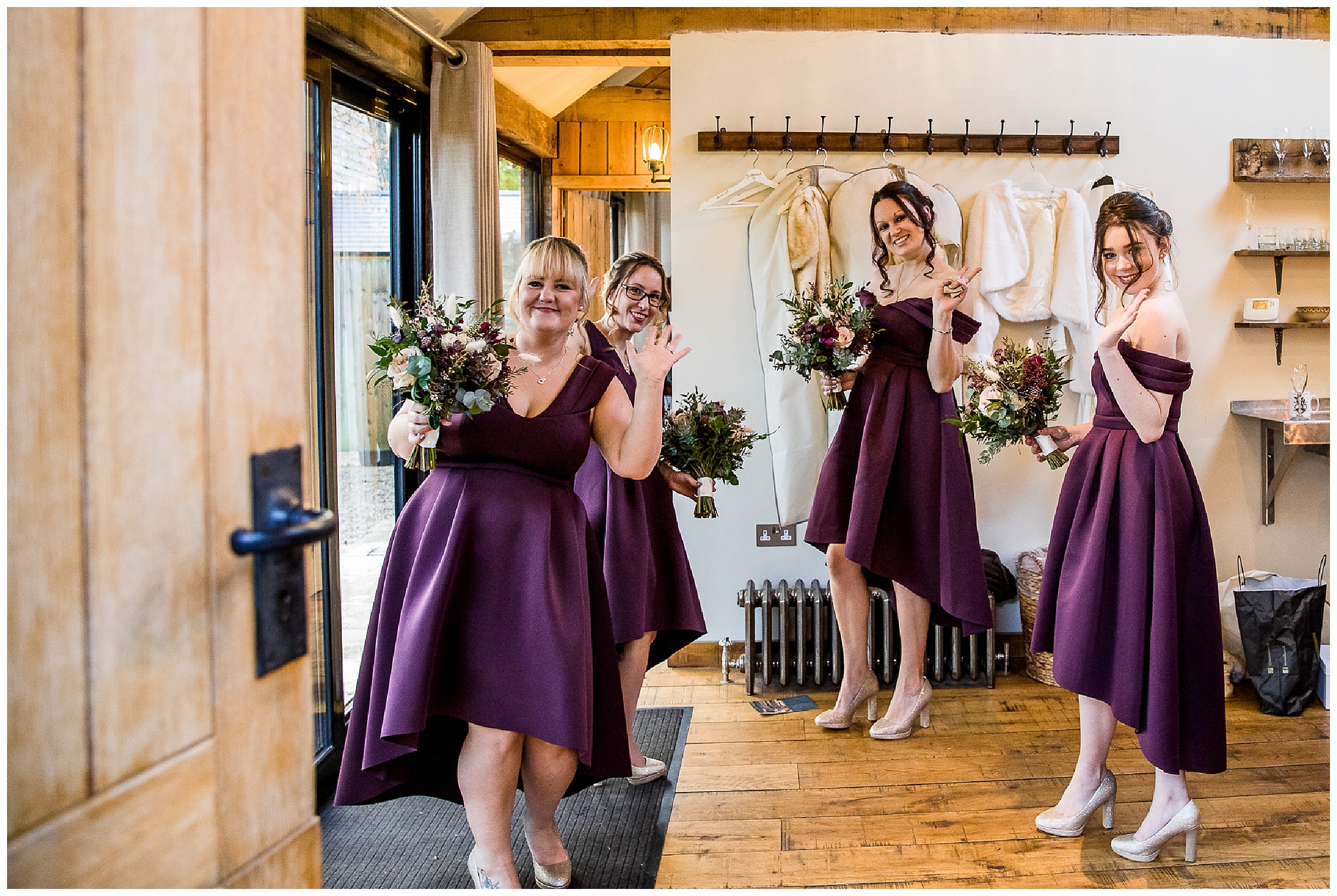 bridesmaids in purple dresses in bridal nook