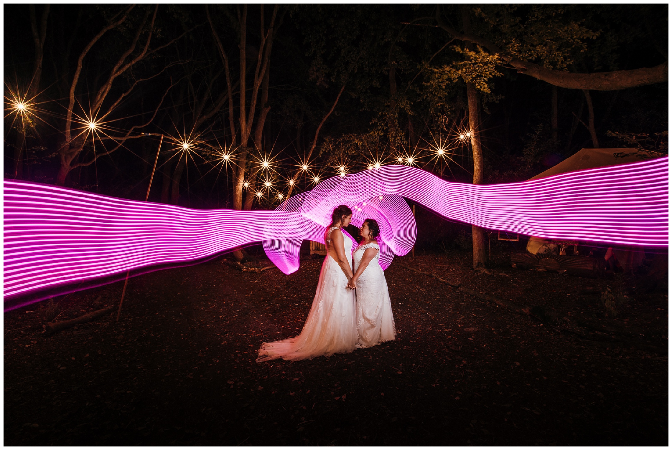 brides stand together at entrance to lilas wood woodland weddings