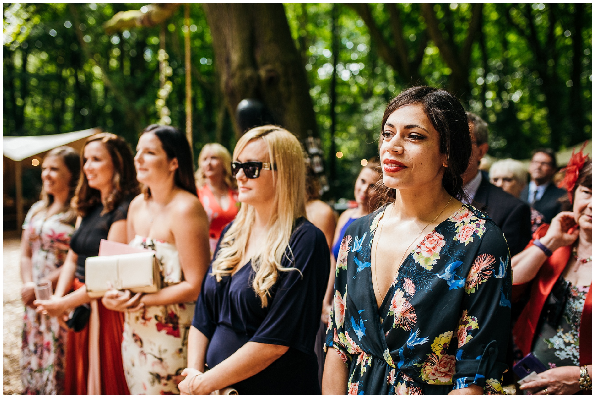 wedding guests look in same direction to wedding ceremony