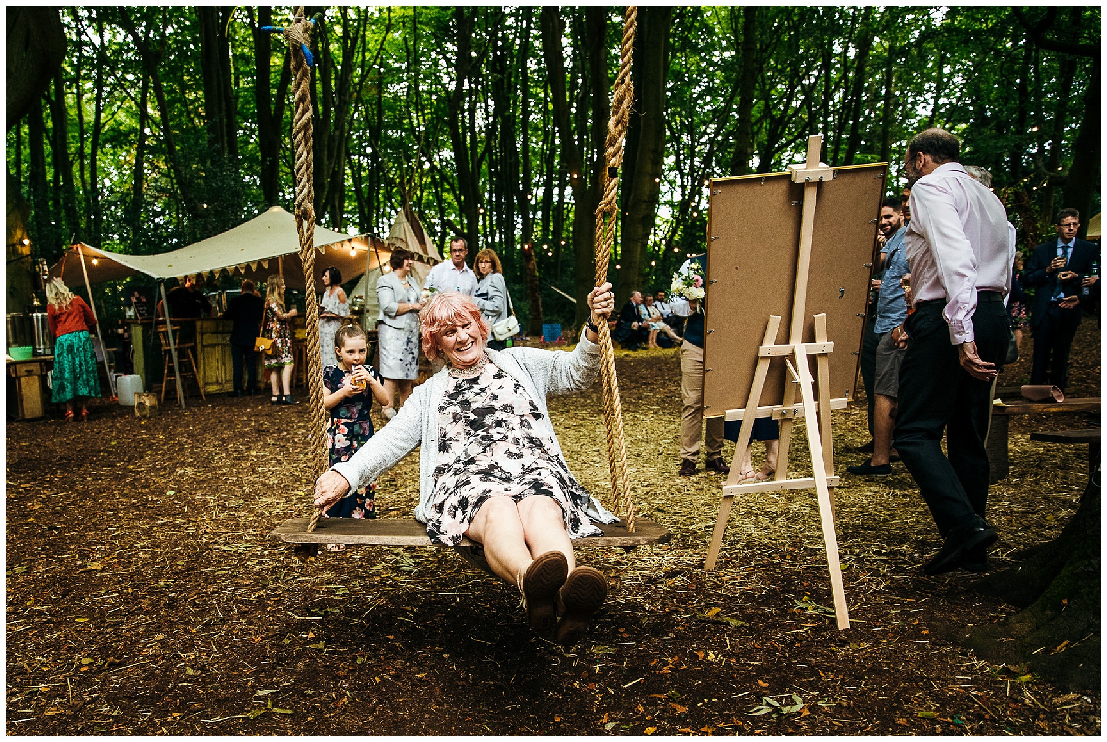 guest on tree swing at lilas wood