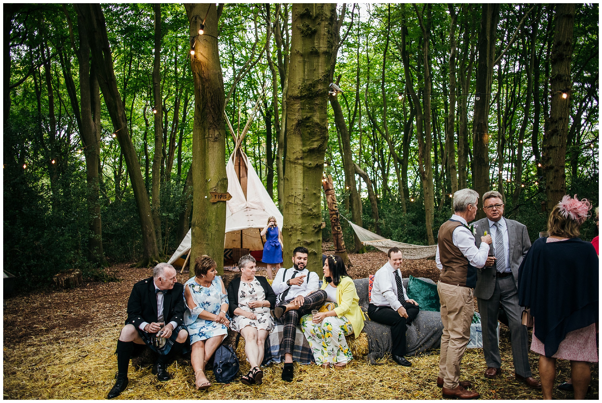 guests relaxing on hay bales