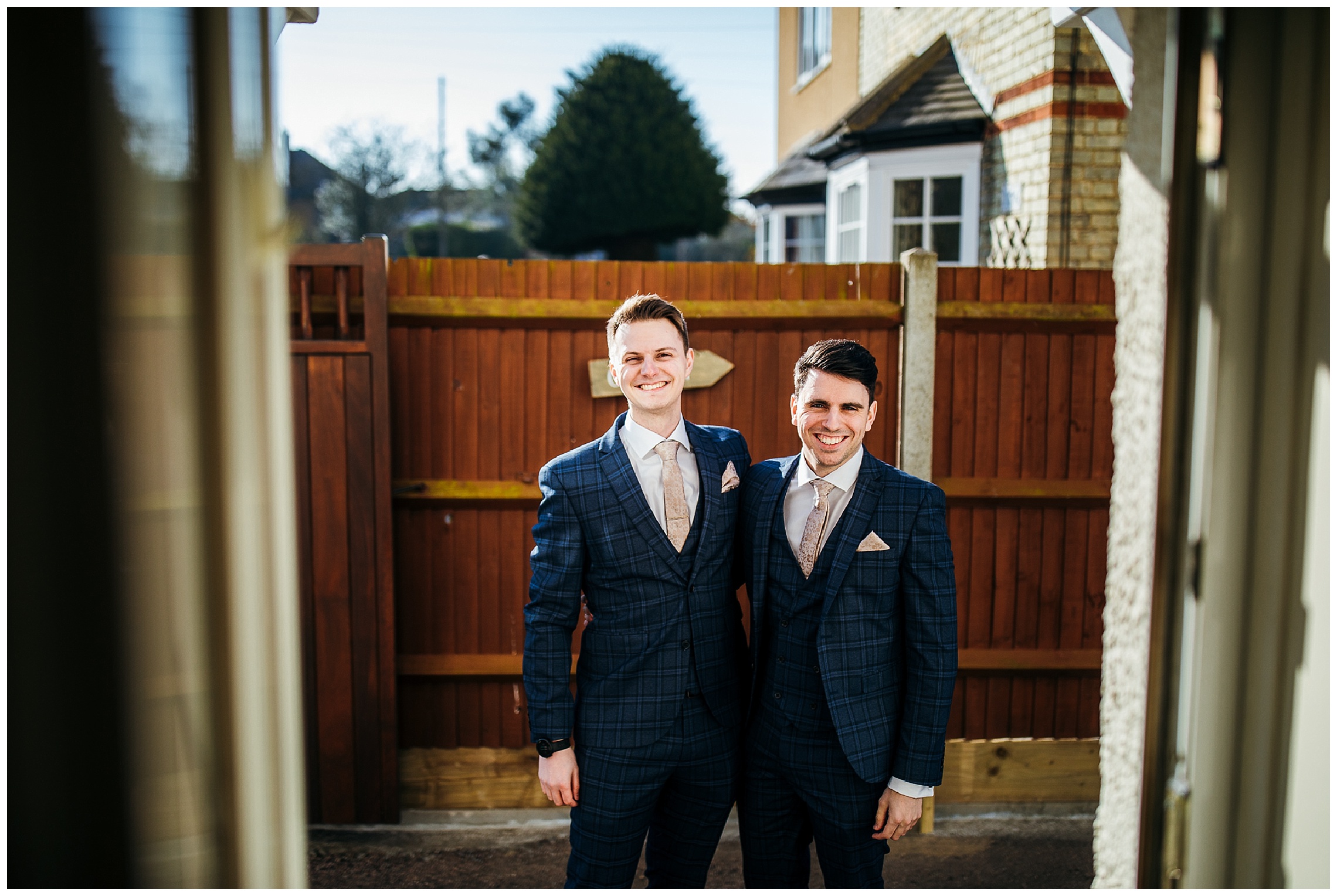 groomsmen smiling