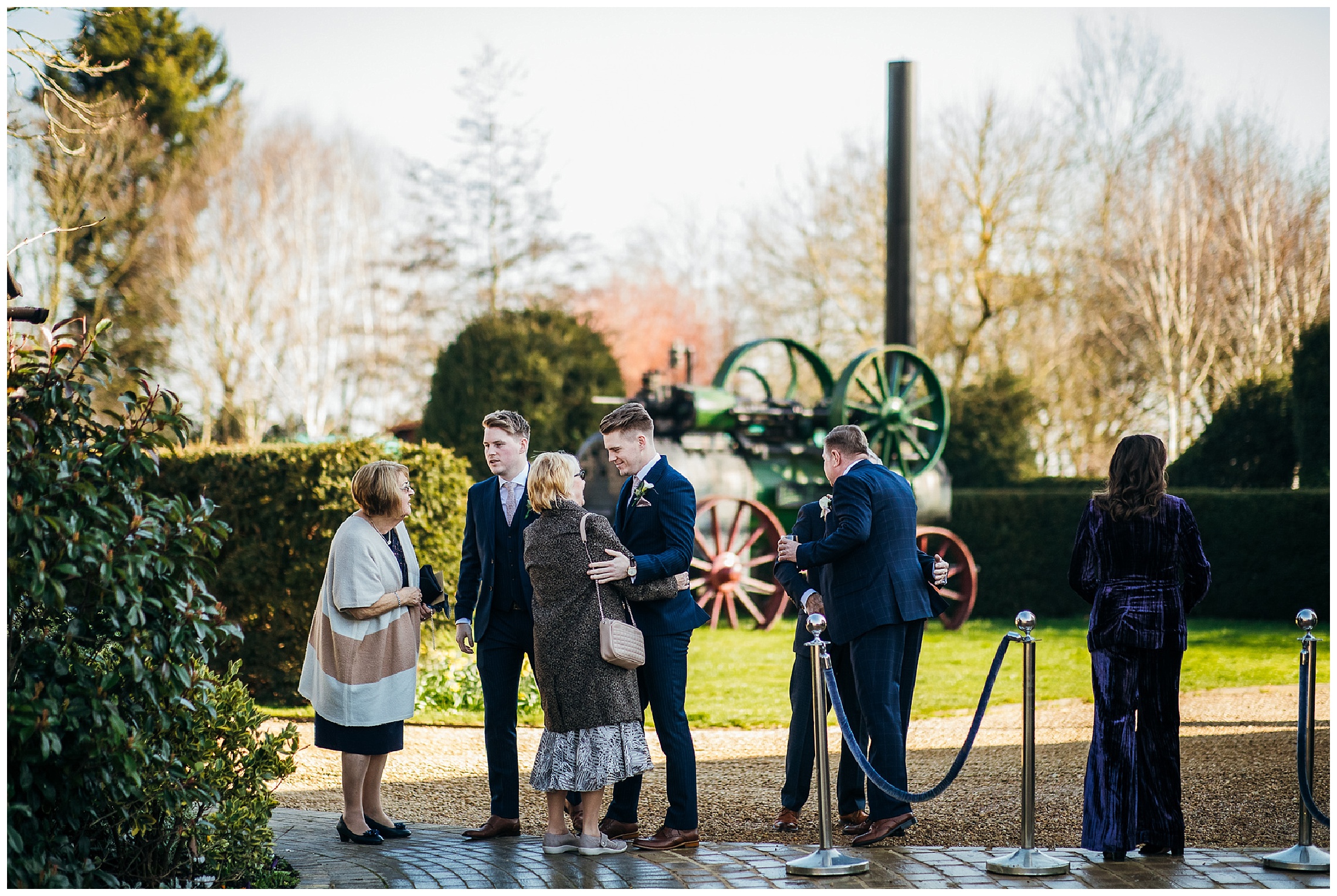 groom greeting wedding guests