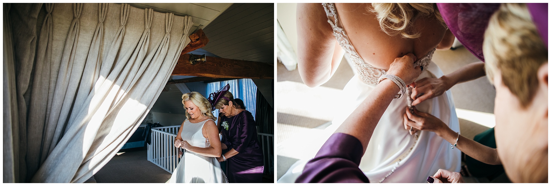 bride standing in her wedding dress and buttons being done up by mother of the bride