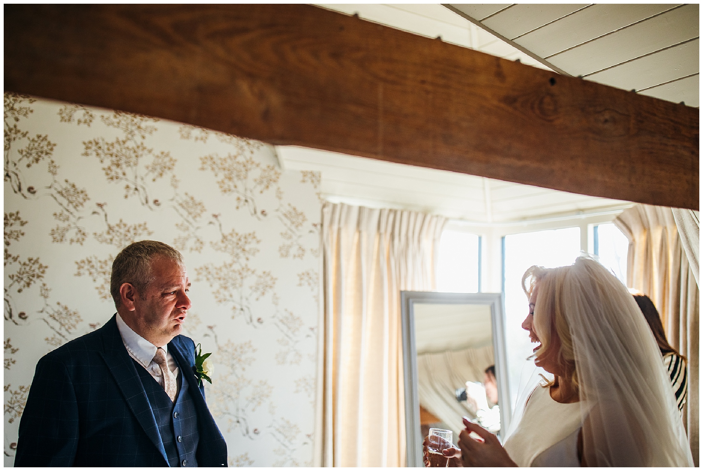 bride and father see each other and smile