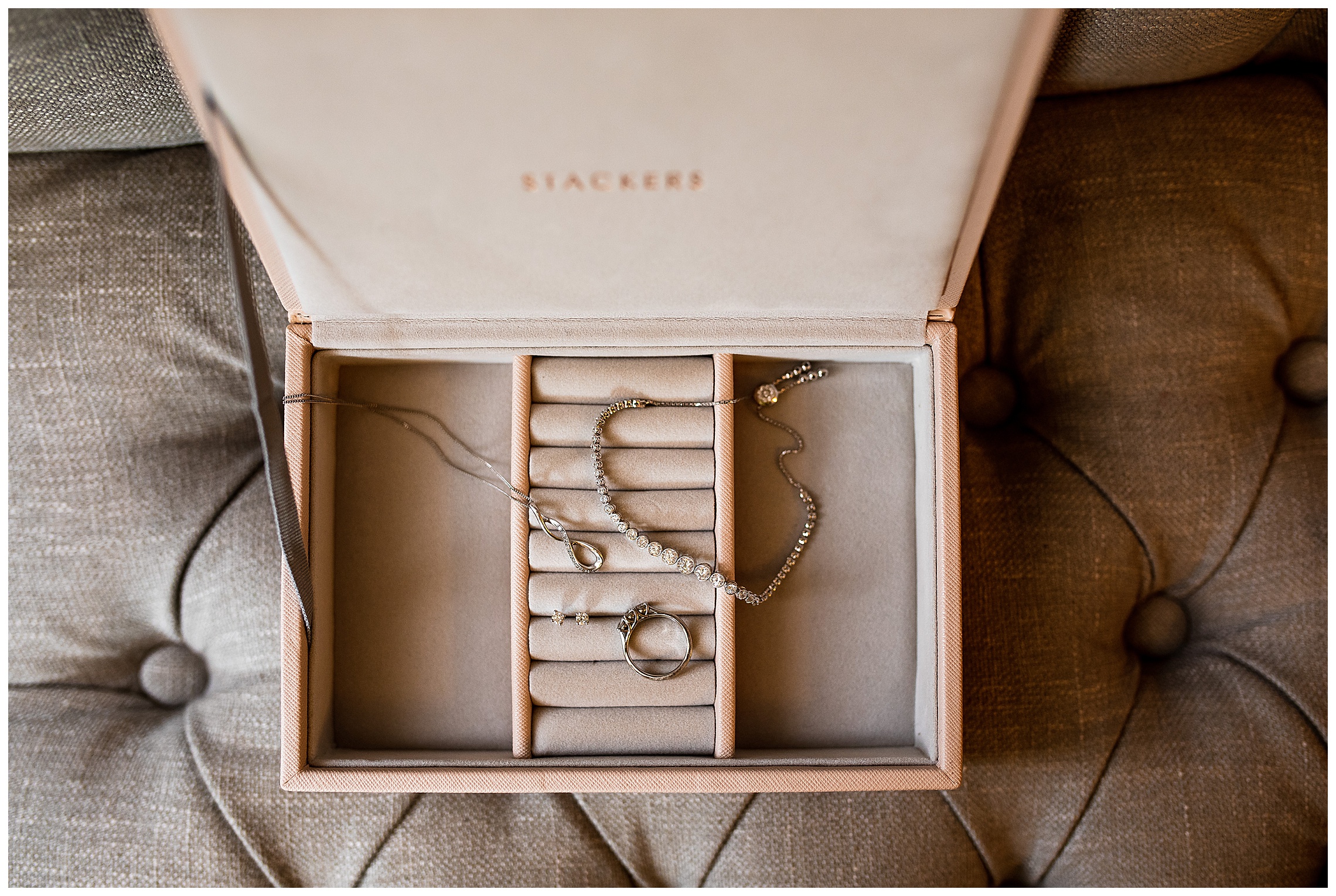 wedding details in pink jewellery box