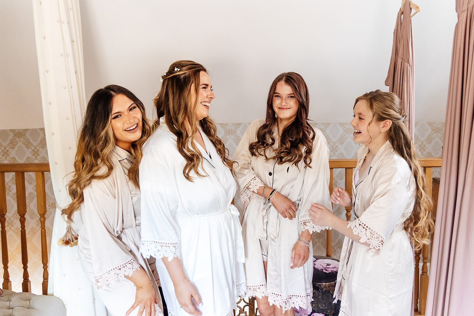 Bride and Bridesmaids in robes getting ready 