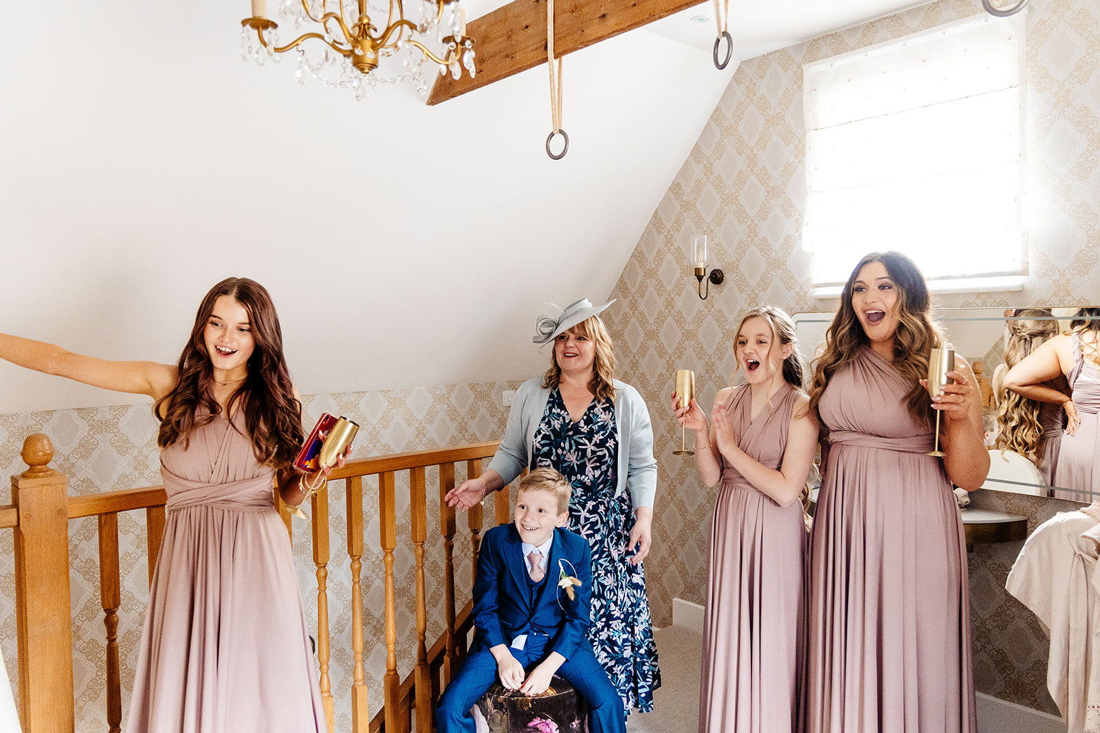 Brides first look with bridesmaids and family 