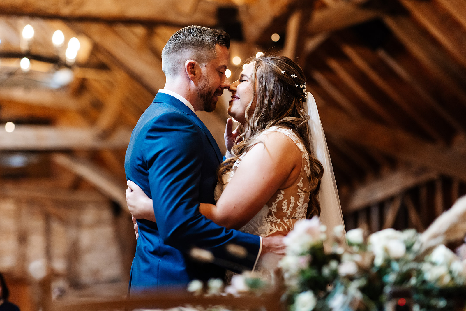 Couple share a kiss after the I do's