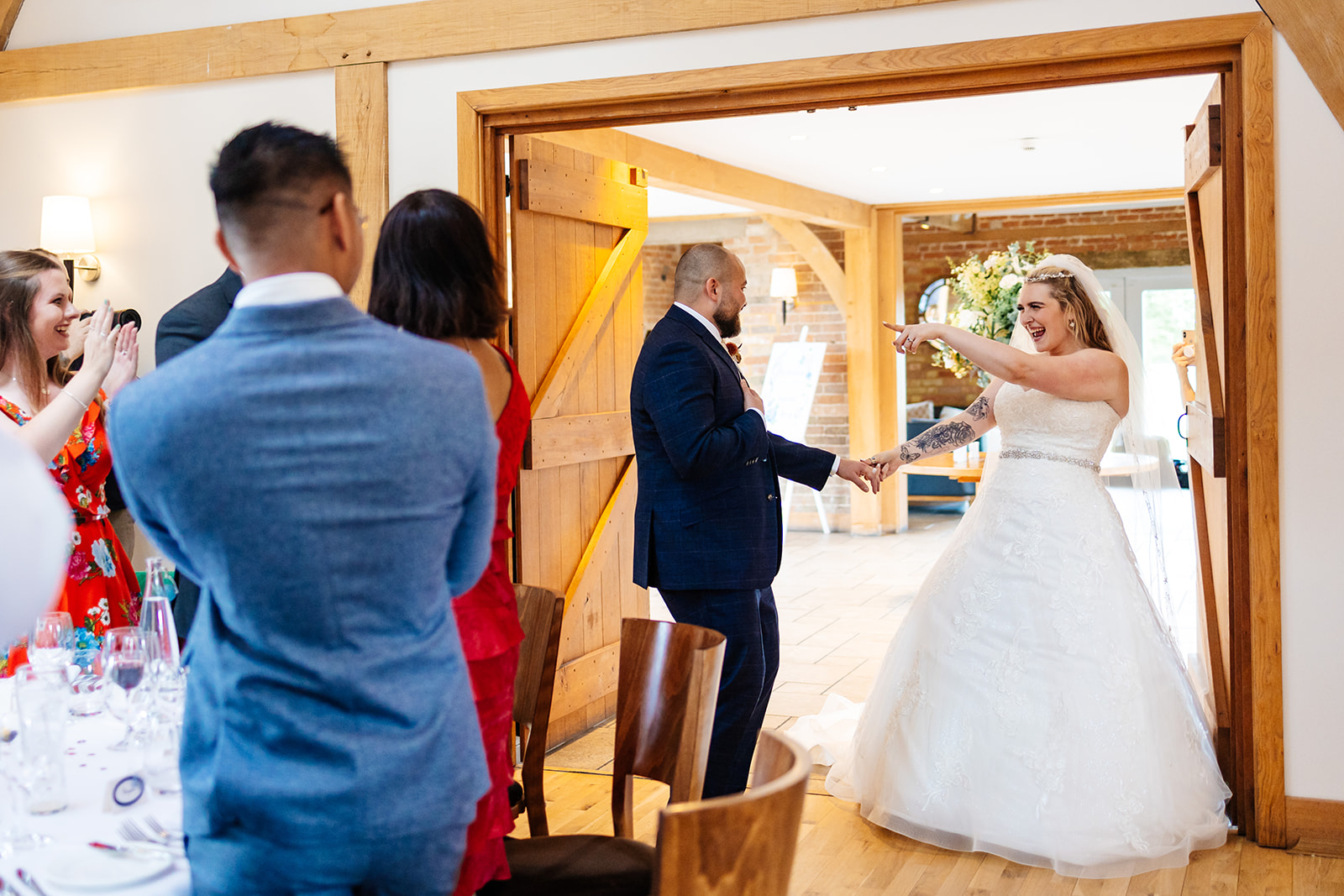 Couple make their entrance into Wedding Breakfast dancing