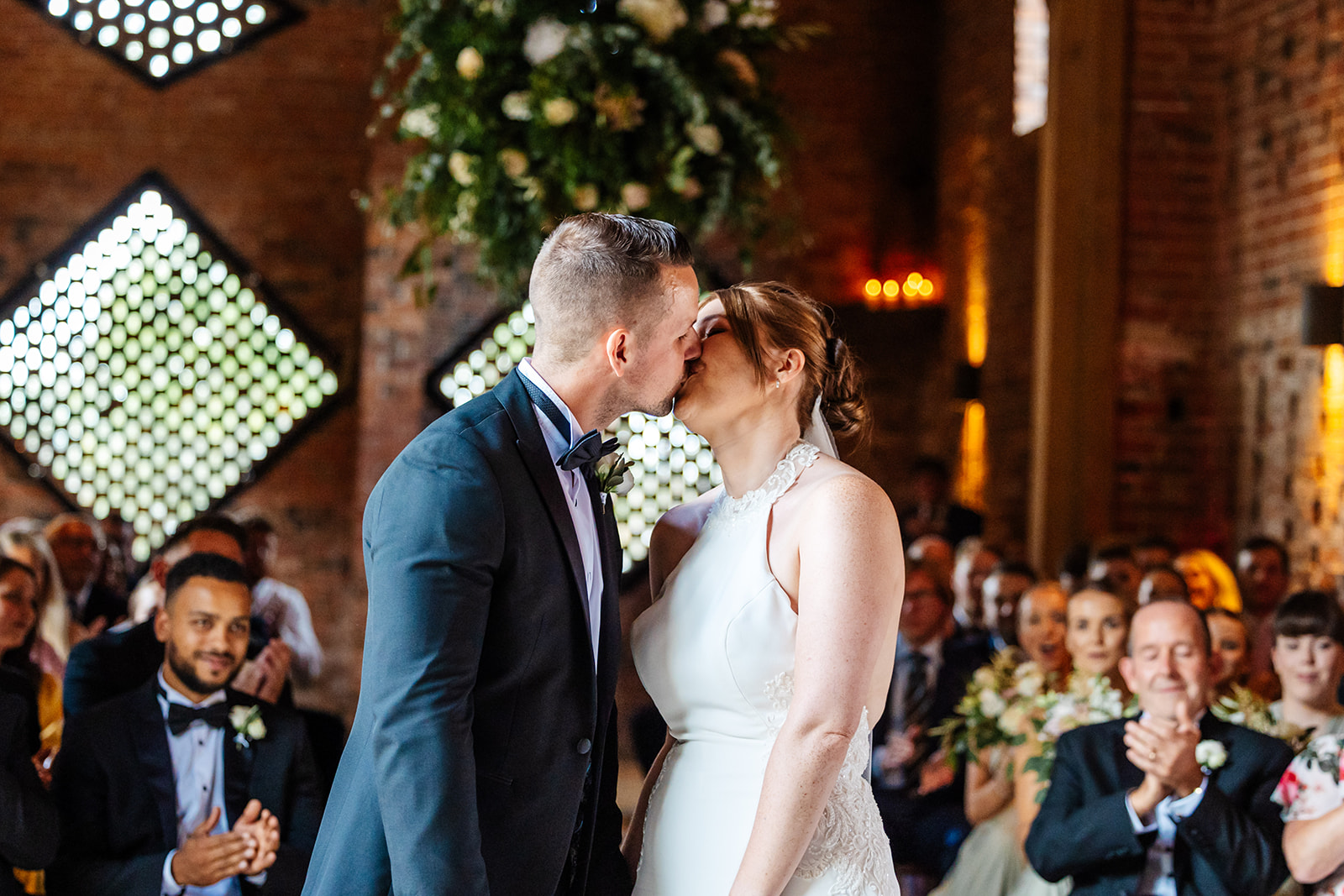 Couple share a kiss after saying 'i-do' 