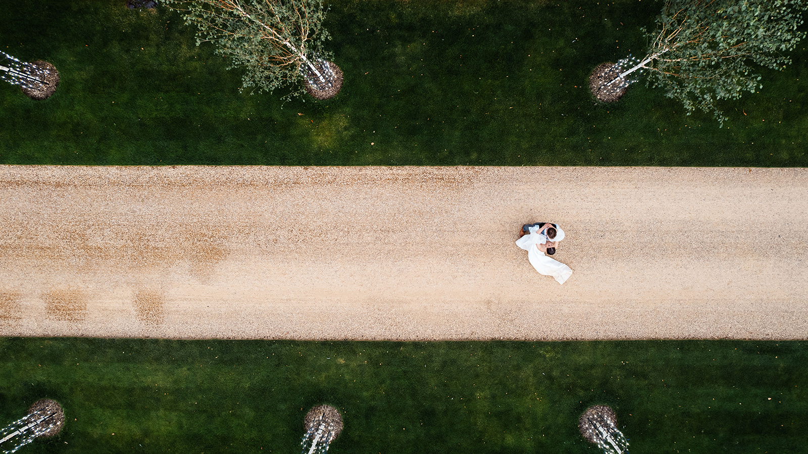 Couple drone shot on driveway